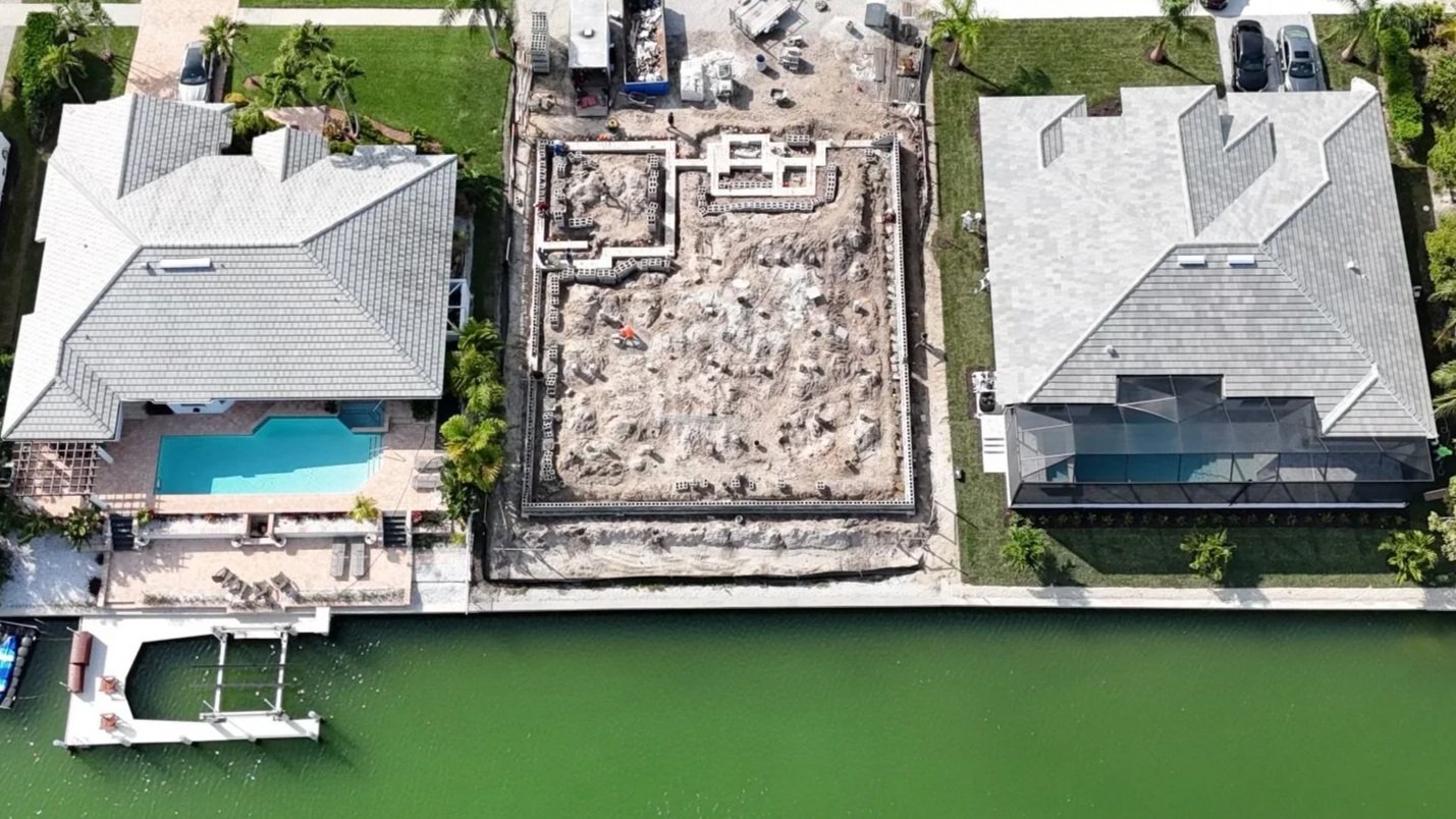 Concrete foundation pour for waterfront custom home Marco Island FL — Alexander2 Construction