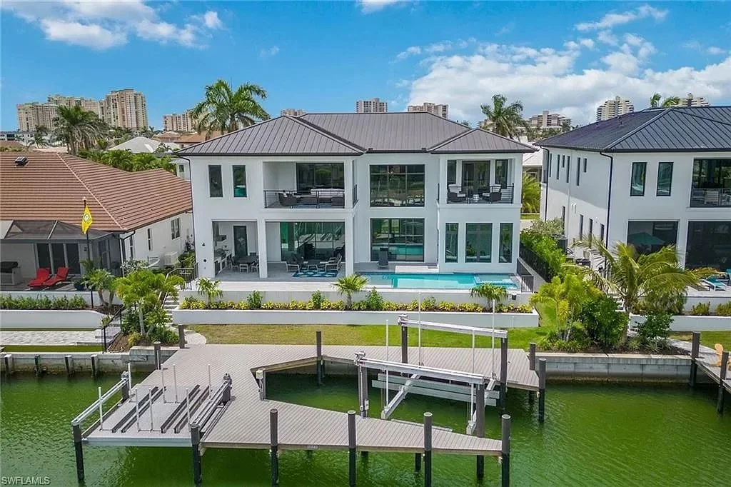 Completed waterfront custom home rear view Marco Island FL — Alexander2 Construction