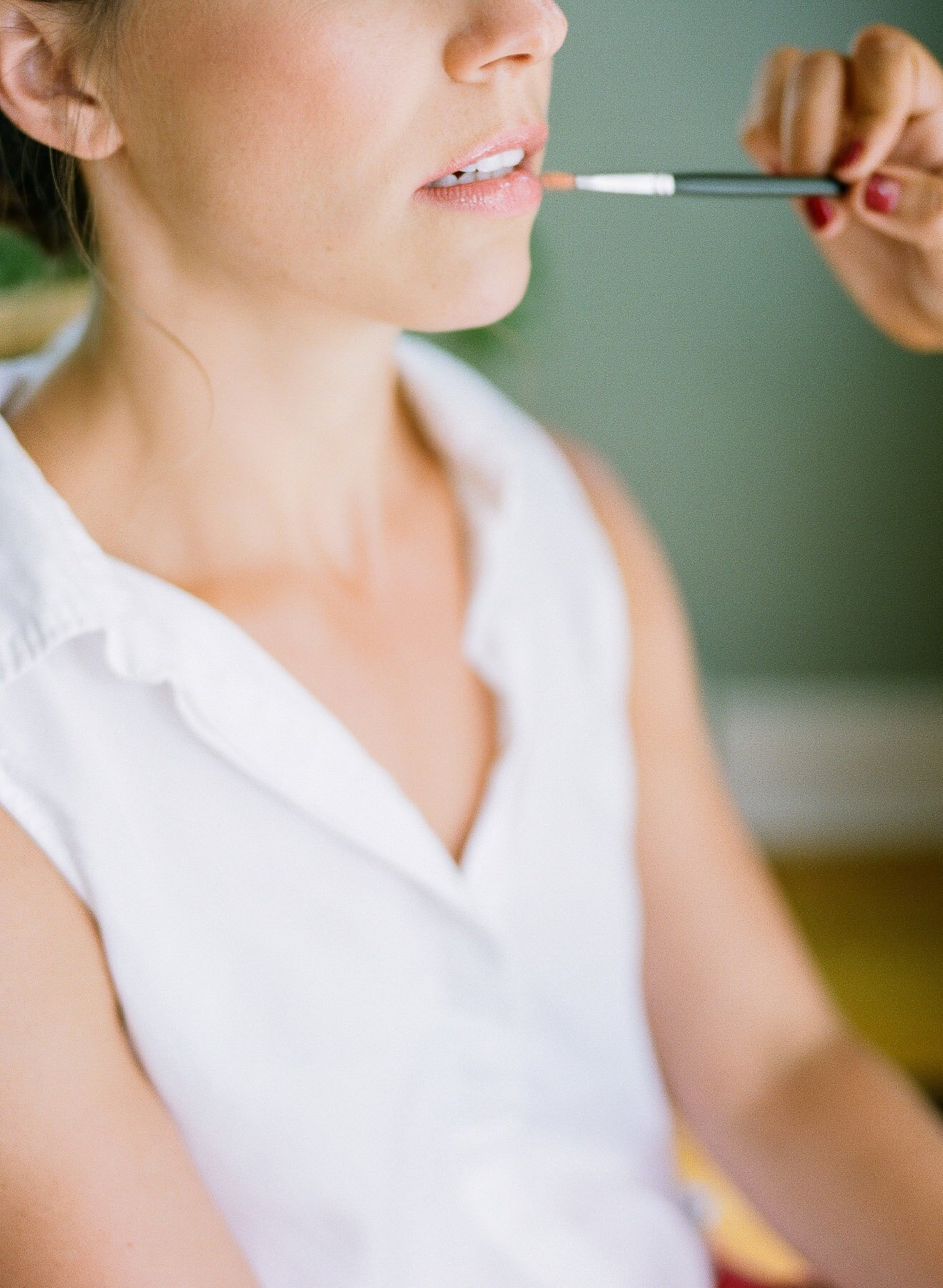 Finishing touches on wedding day bridal prep