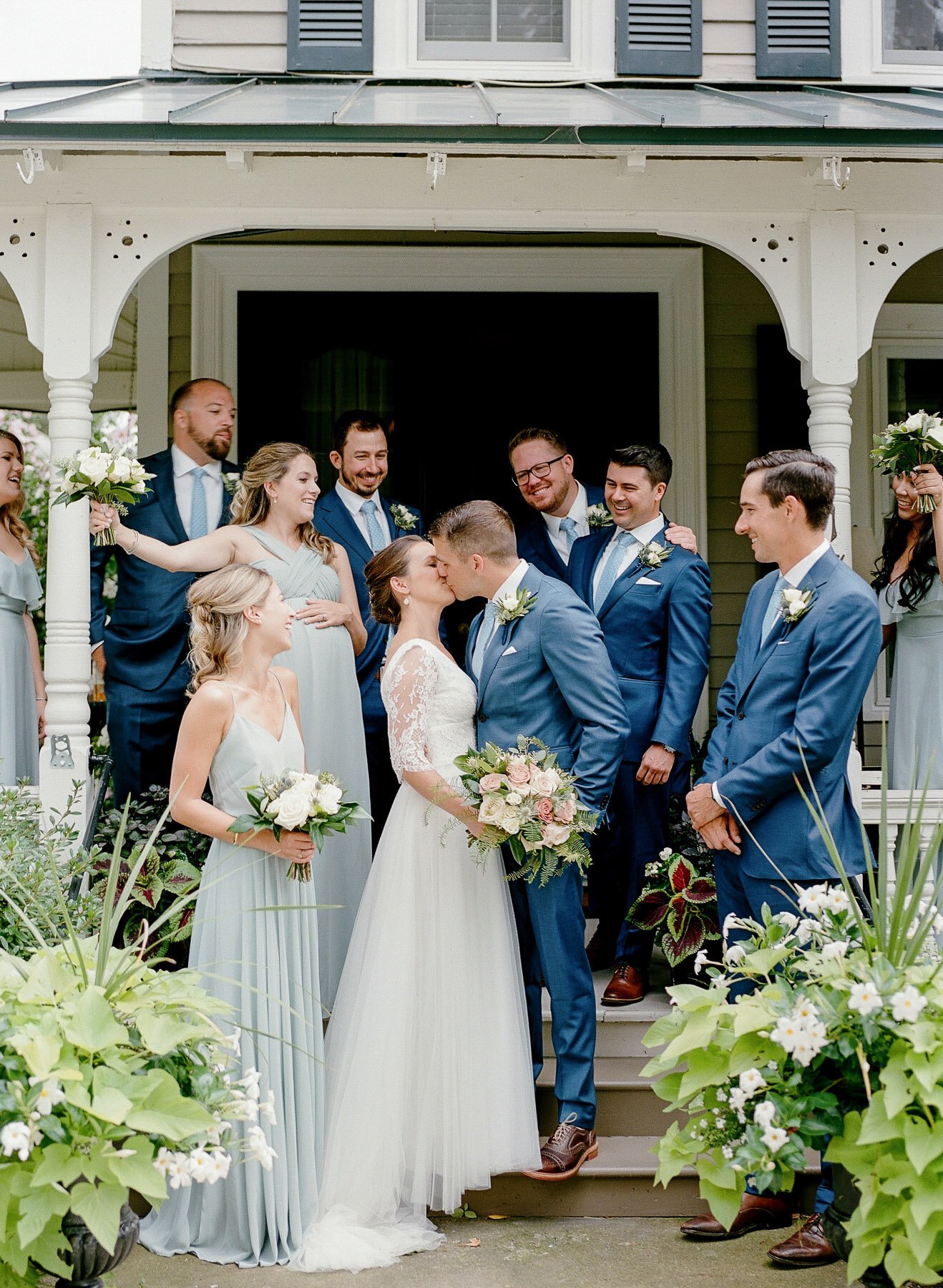 Photo of bridal party on porch