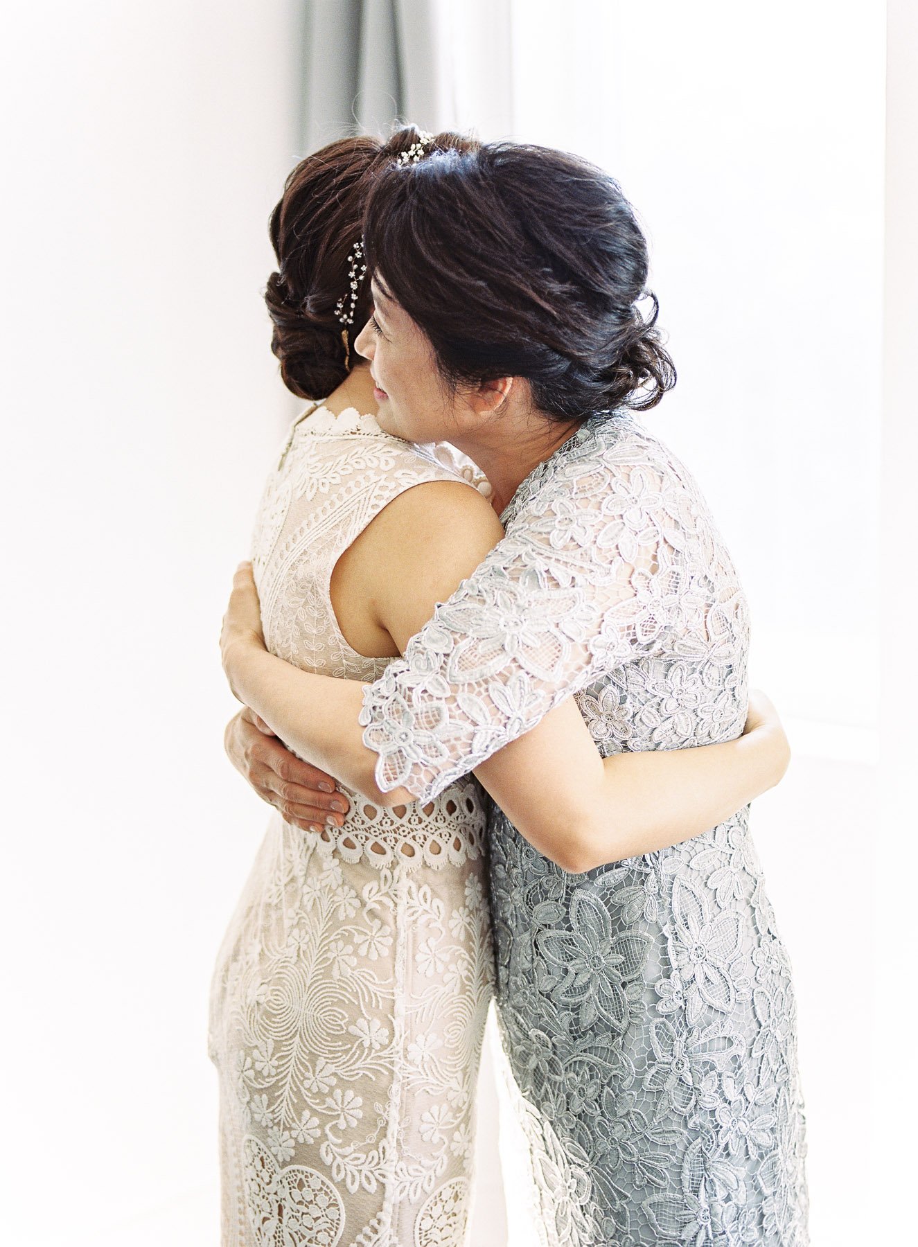 Bride and Mother Hugging