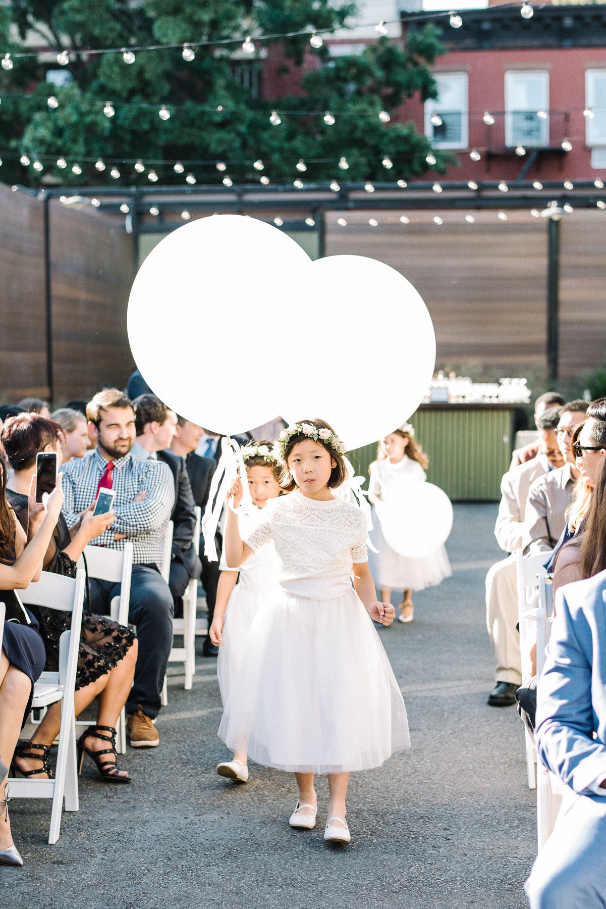 Flower Girls Carrying Balloons