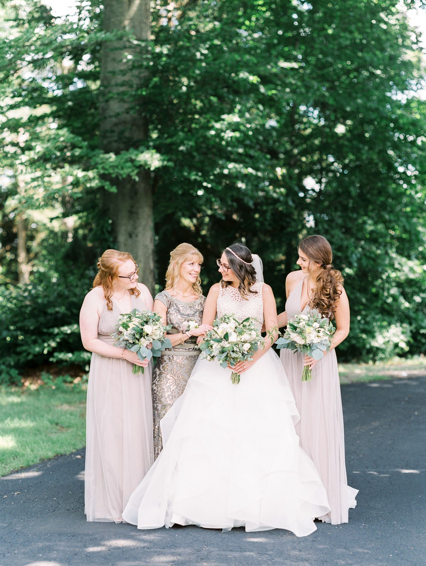 Bridal party in shade of pastel purple Amsale