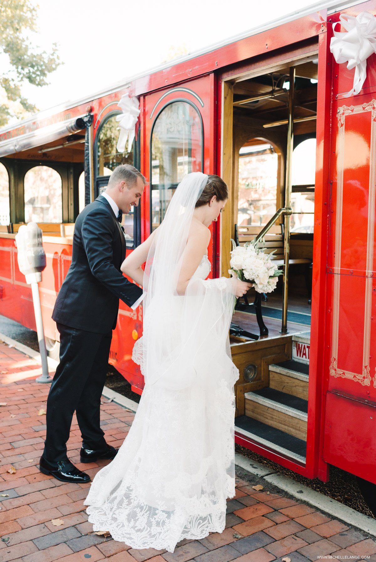 Bride and Groom Leaving on Trolley Riverhouse at Rumson Country Club Wedding 