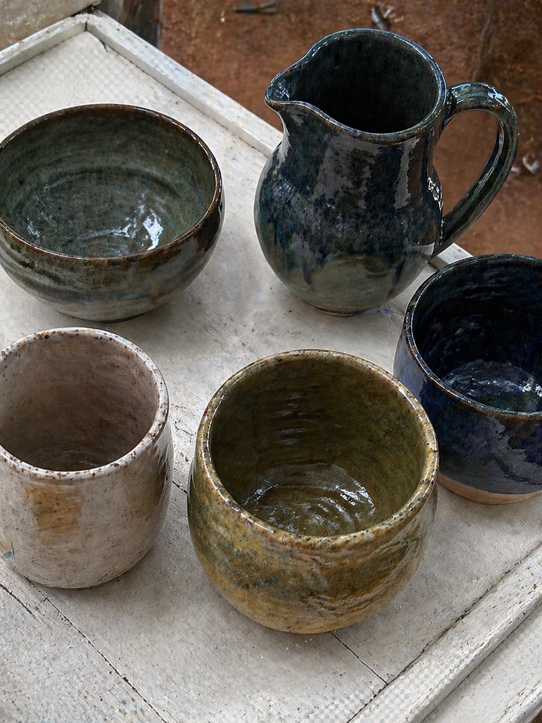 Rustic Handmade Ceramic Bowls and Pitcher at a Caribbean Artisan Shop