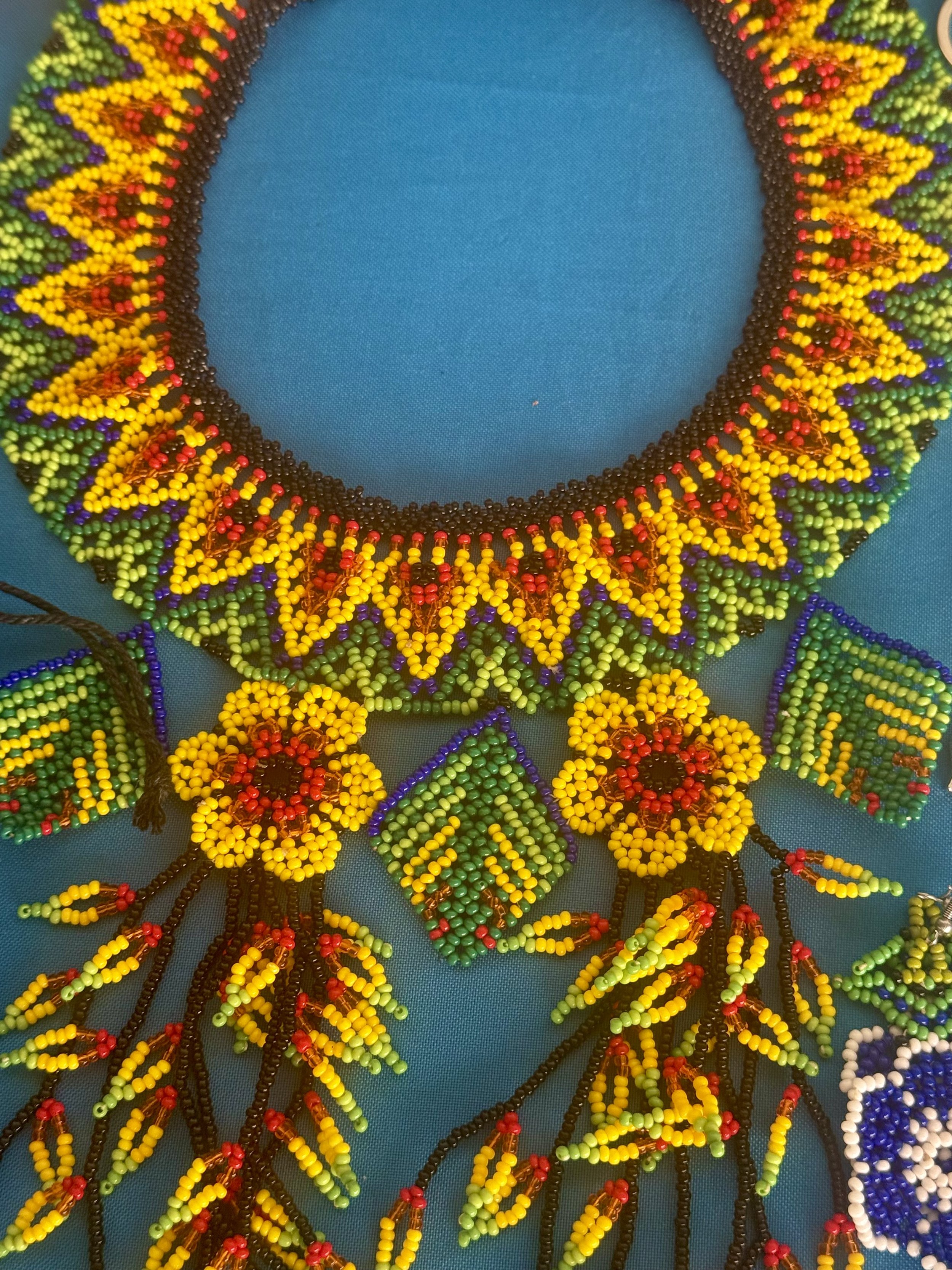 Colorful beaded necklace and handmade jewelry in Colon, Panama market.