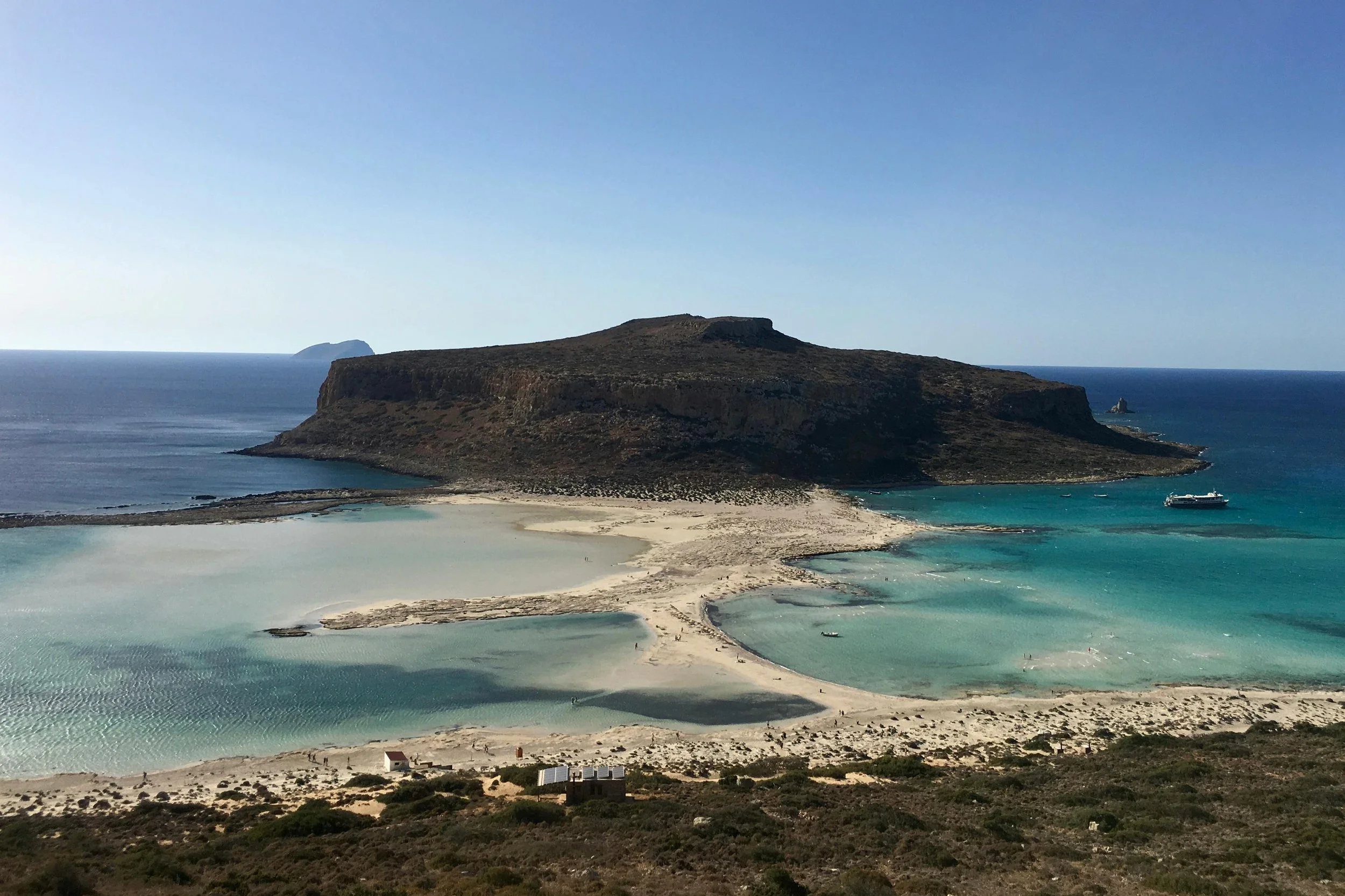 Aerial view of Balos Lagoon with turquoise waters and white sand in Chania, Crete.