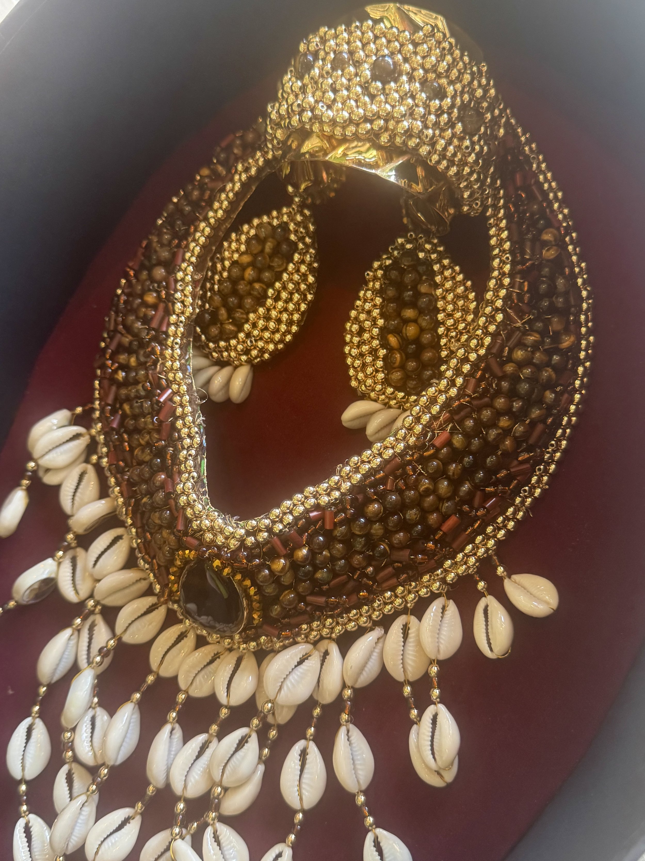 Beaded necklace with shells and handmade jewelry in Limon, Costa Rica market.