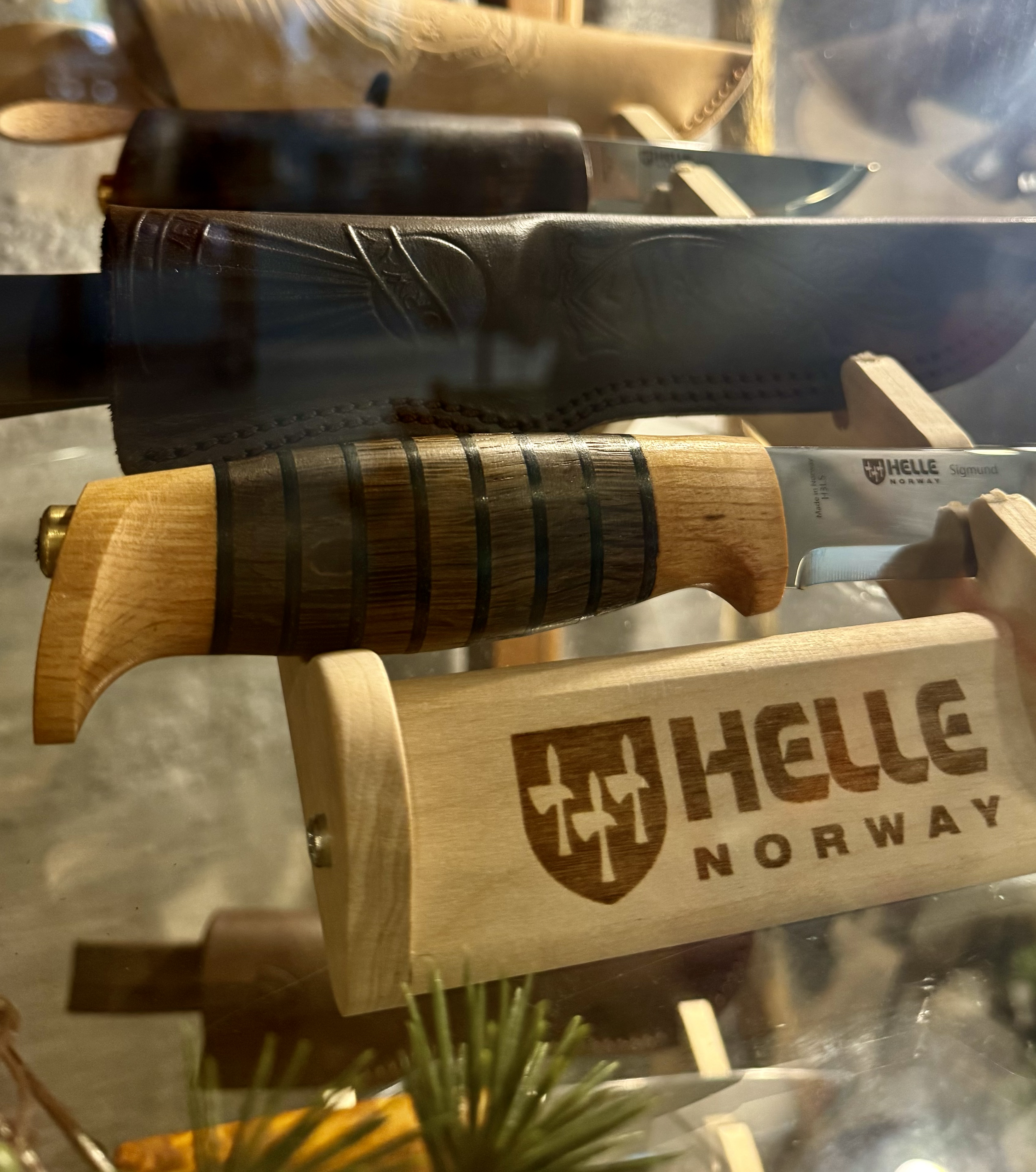 Helle Norway handcrafted Scandinavian outdoor knife with wooden handle on display