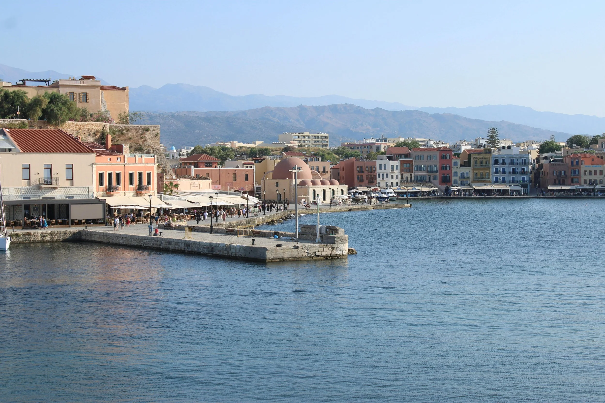 Panoramic view of the Venetian Harbor waterfront and old town in Chania, Crete.