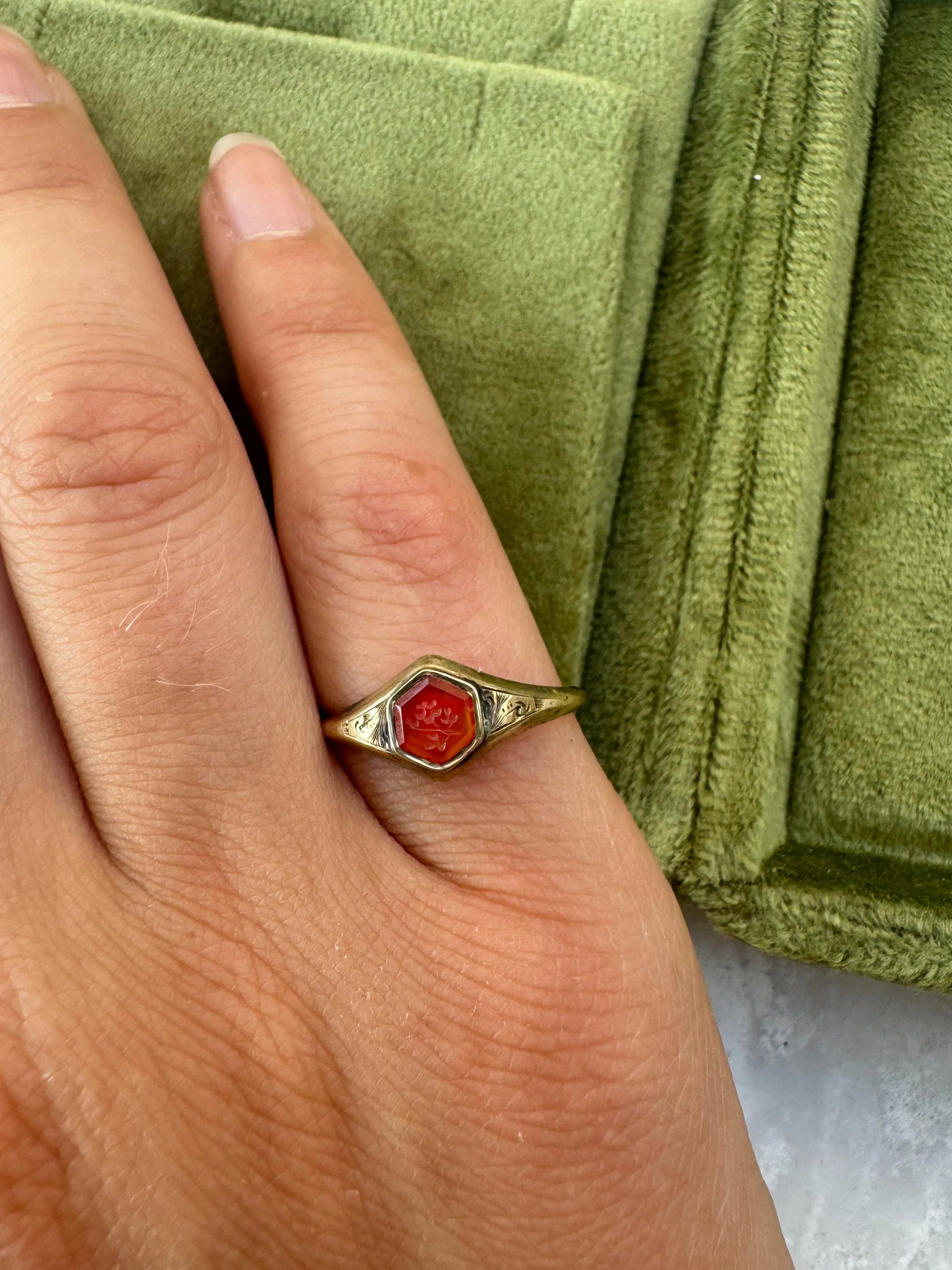 Forget-me-nots have been used in jewellery as symbols of love and remembrance for centuries.

This lovely little antique signet ring has been in the same family for several generations, although possibly more through luck than preservation - it was r