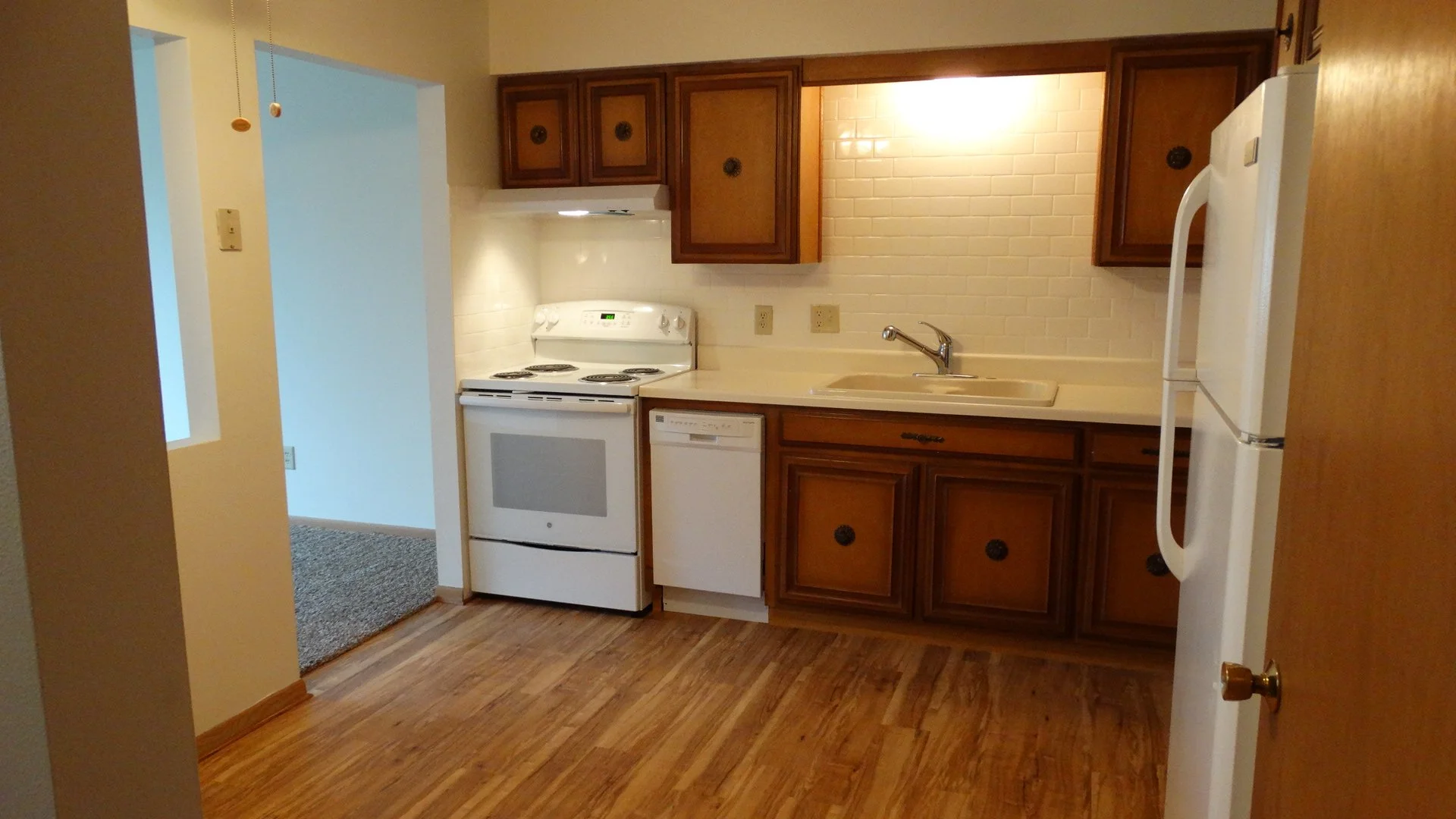 Kitchen inside a 1-bedroom apartment at Hartwell Place Apartments 301