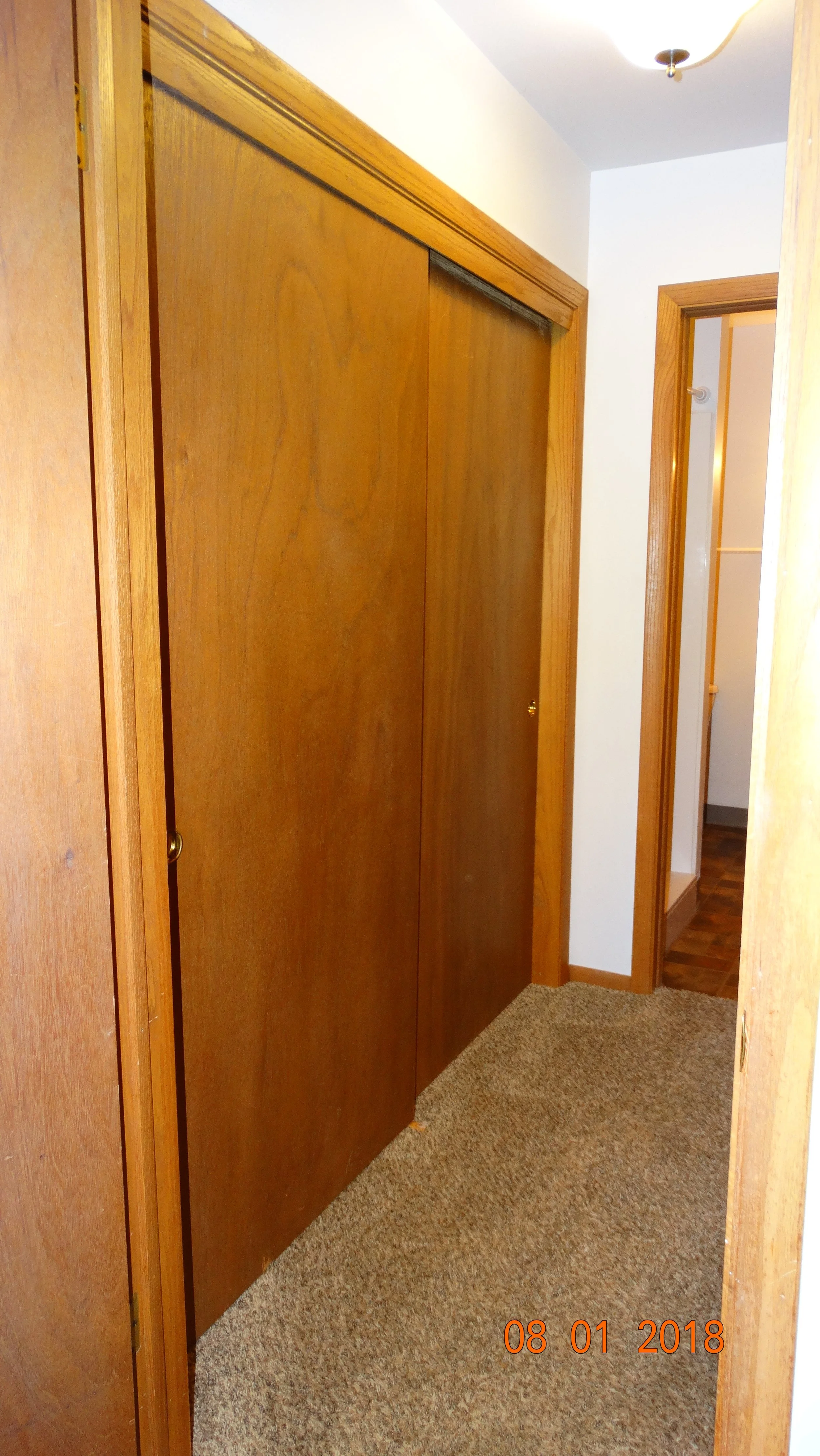 Hallway closet 2-bedroom apartment at Hartwell Place Apartments in Waukesha