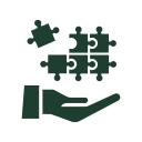 Hand holding puzzle pieces