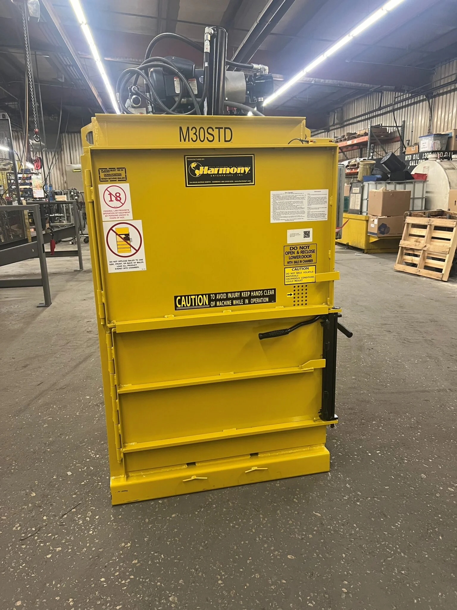 A vertical cardboard baler available to Falcon clients with high cardboard volume.