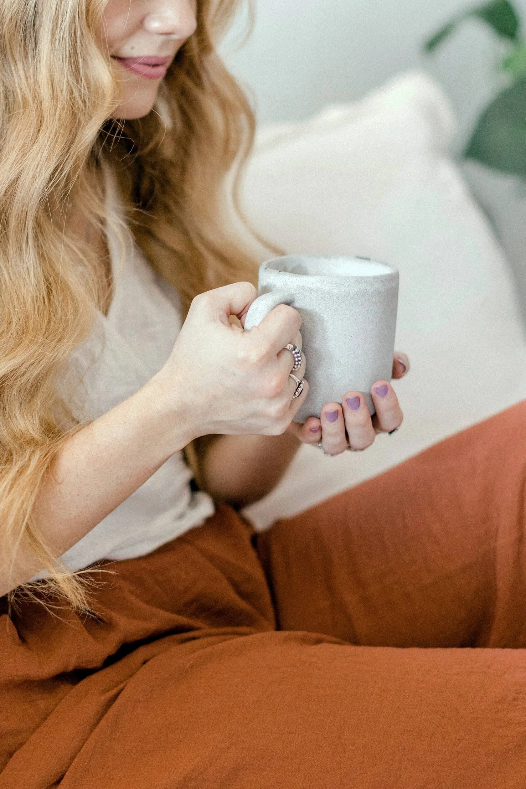 woman holding teacup setting boundaries