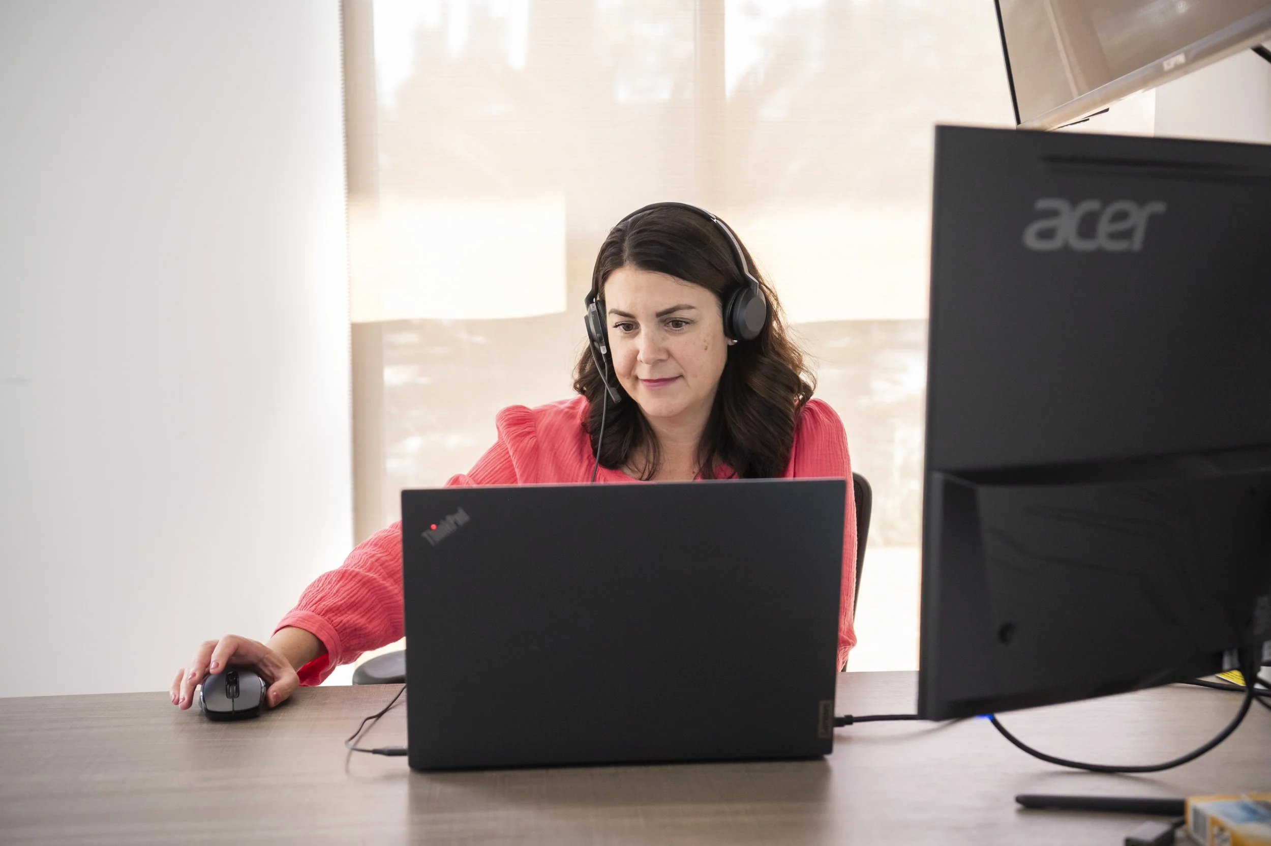 Our Excelerate consultant discussing process optimization opportunities with a client.