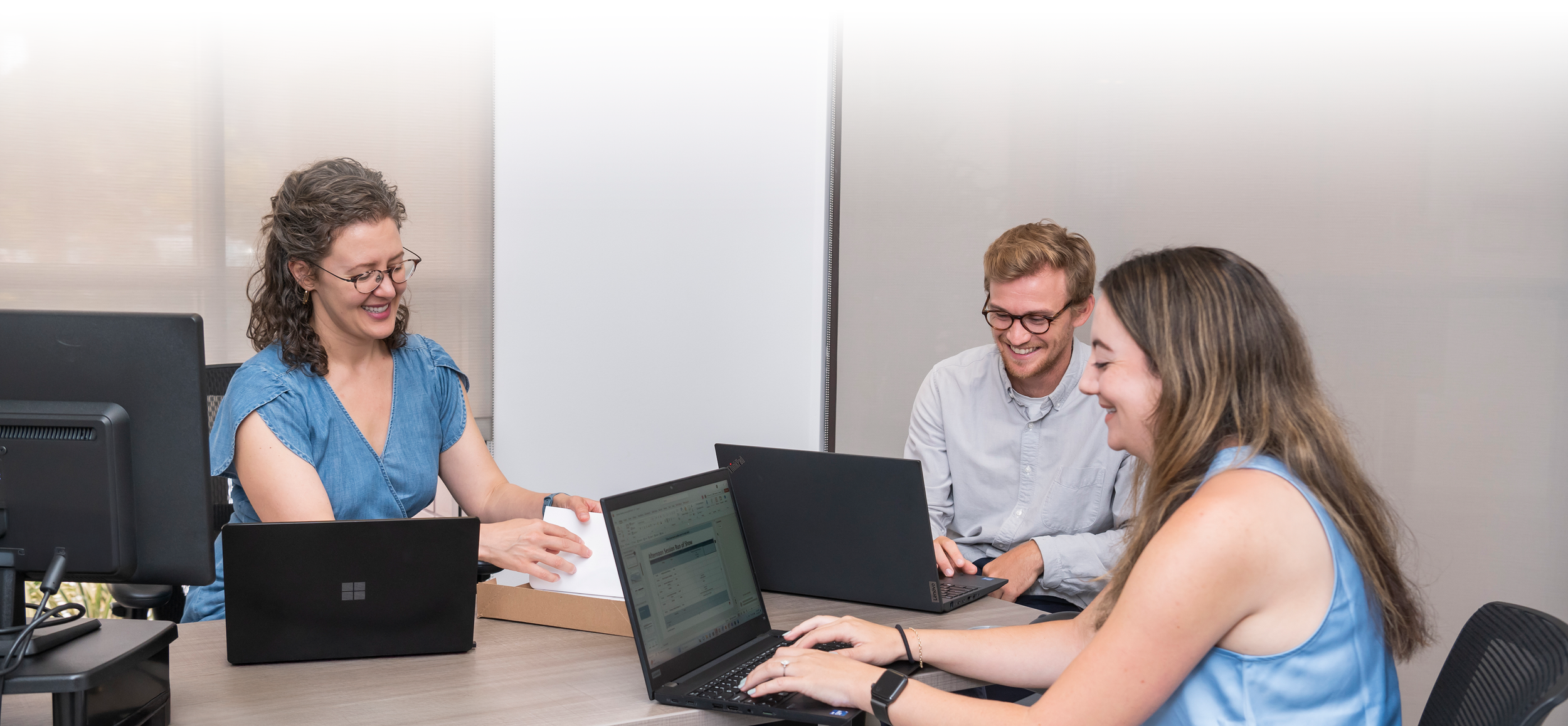 Excelerate analysts reviewing system integration map to improve data flow across enterprise platforms.