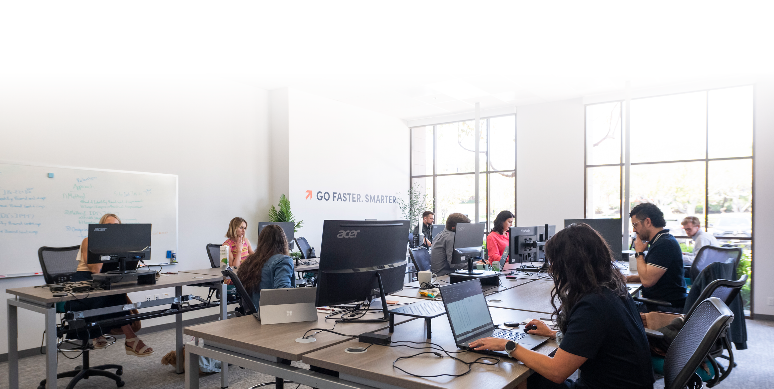 Excelerate consultants working in unison to drive a transformation initiative to the finish line through careful project management.