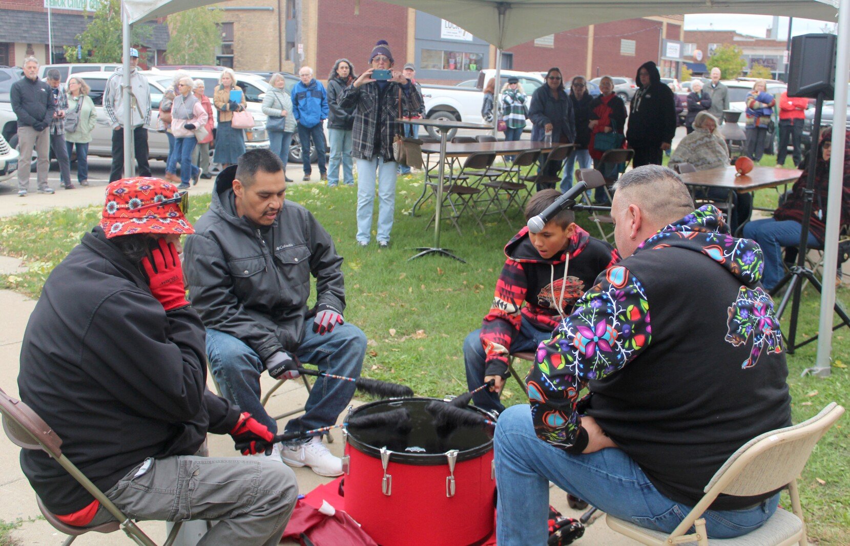  Drummers from The Four Skins – from left, Ed Miller Jr., Darryl Basswood, Justice Swiers and Ricky Smith – from the Pine Point community were part of grand opening ceremonies outside the museum.  Lorie Skarpness / Enterprise  