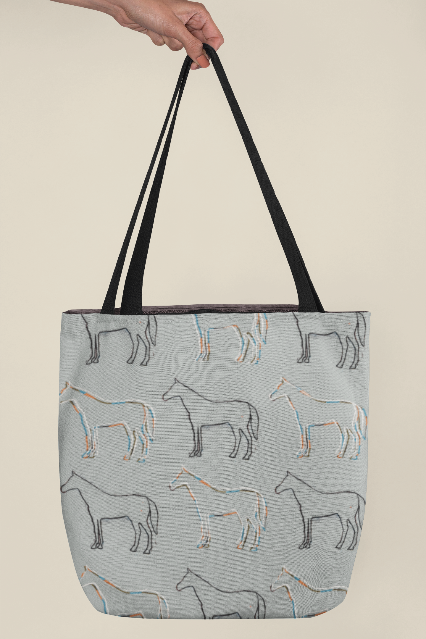 mockup-of-a-hand-holding-a-tote-bag-in-a-studio-24831.png