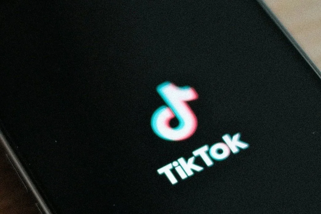Smartphone screen displaying the TikTok app logo and name.