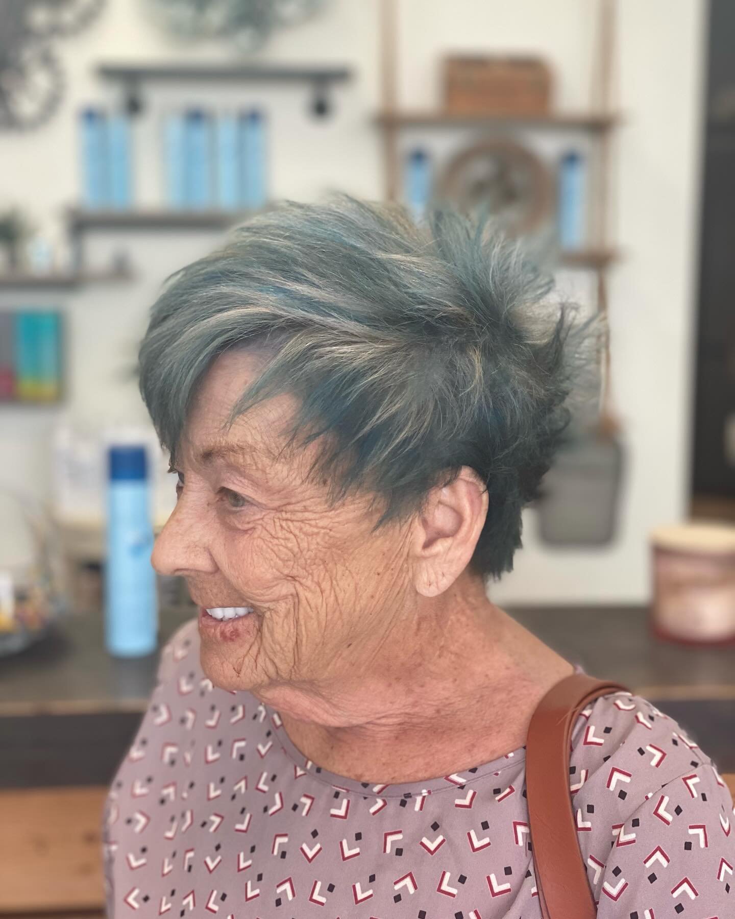 A true blue-grey and blonde blend color to help with the natural grow out. It&rsquo;s also just fun with with her  fun and edgy cut as well. To book with me click the website link in my bio.