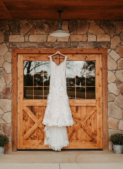 Wedding dress at Troyer’s Prairie Gold wedding venue in Garnett, Kansas