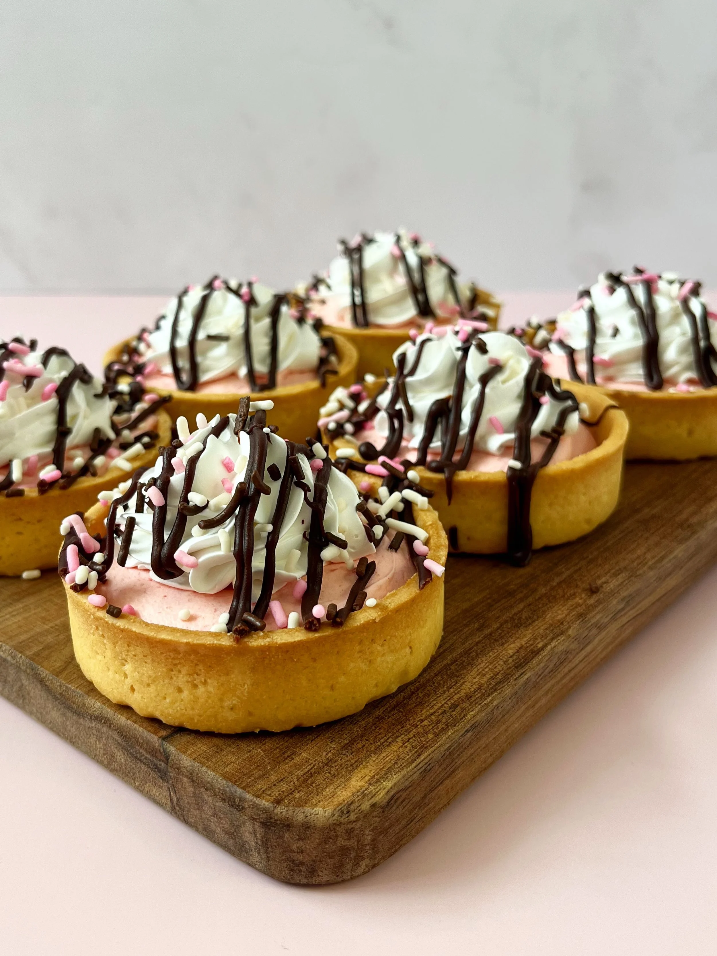 Neapolitan Tarts are now available! 🩷🤍🤎