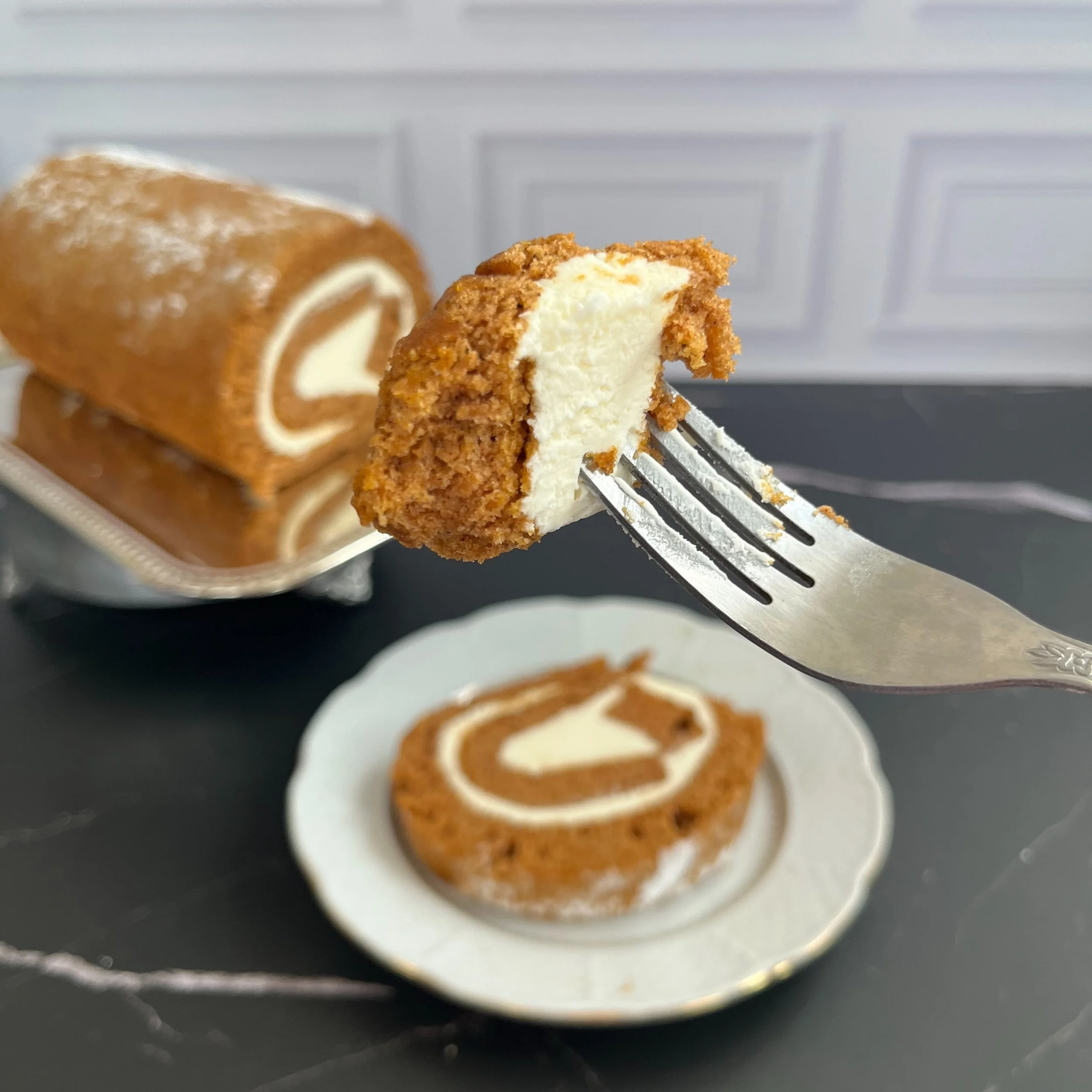 Our Pumpkin Roll is available now in the case and available for order!! 😍