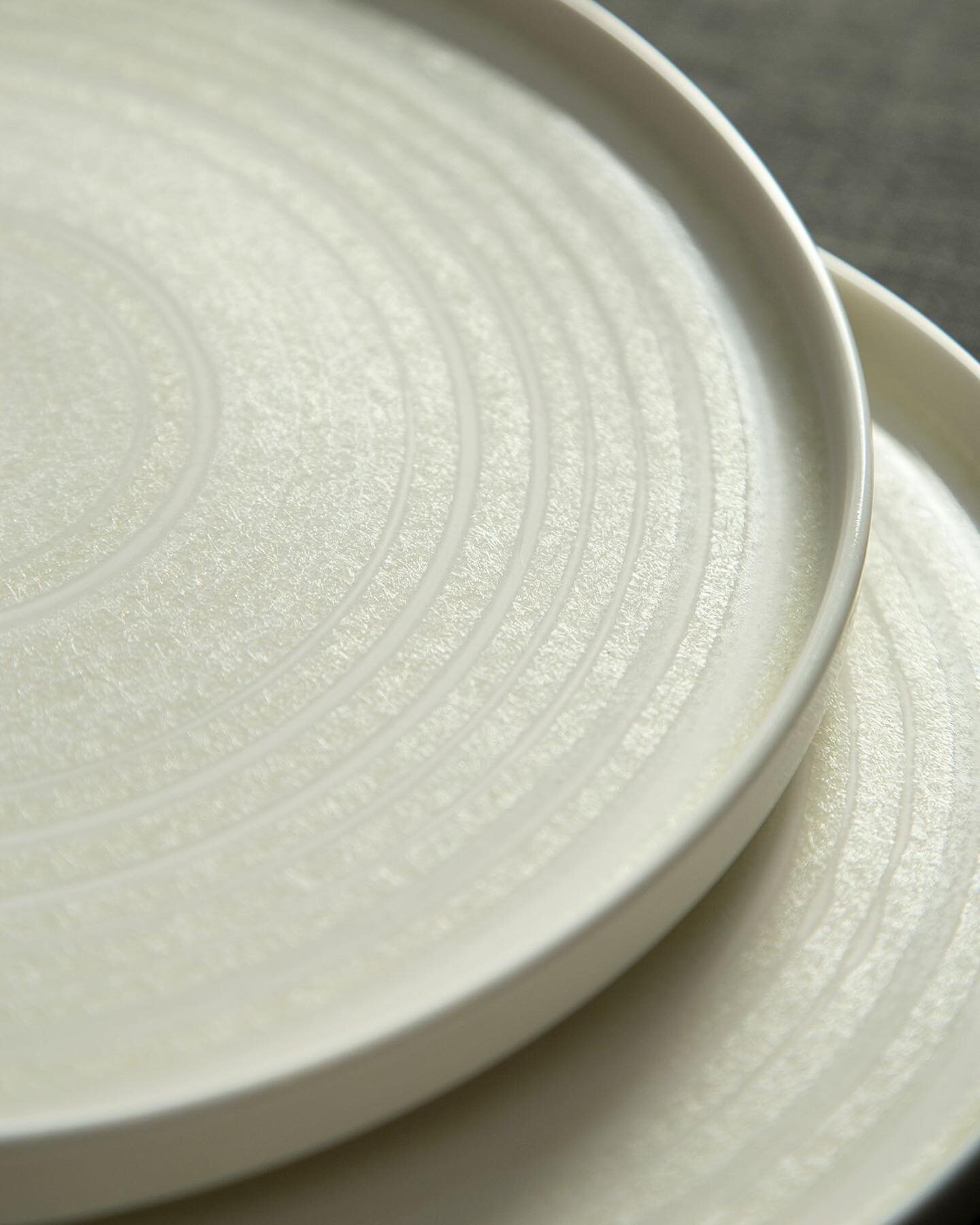 Ceramic cream plates up close. Handmade with an off-white reactive glaze. ✨✨