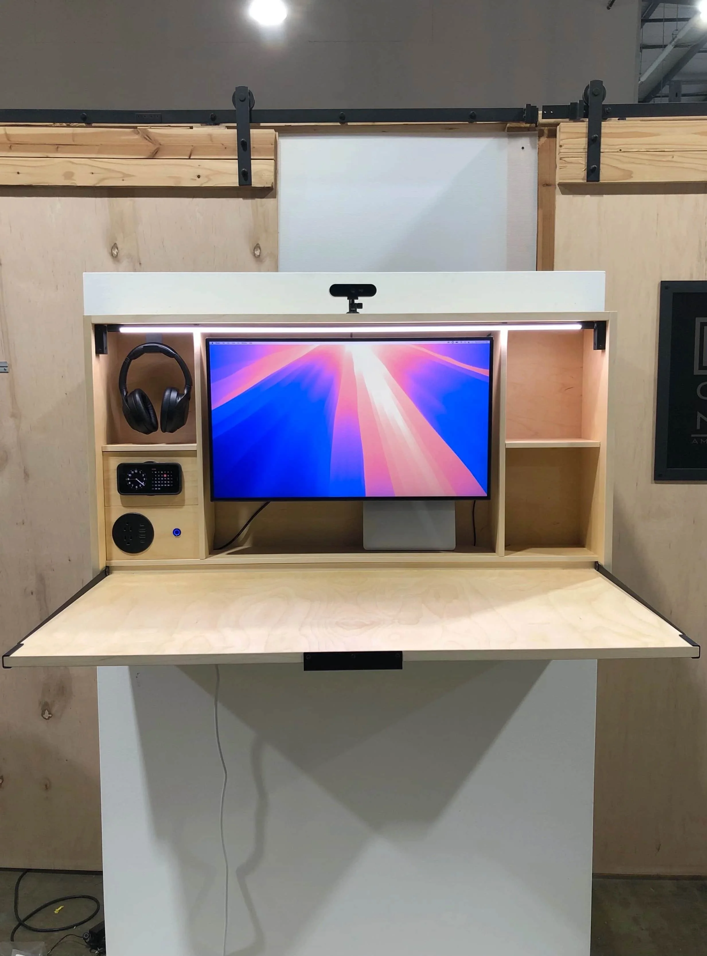 Razorclam murphy desk with modular accessories installed on wall