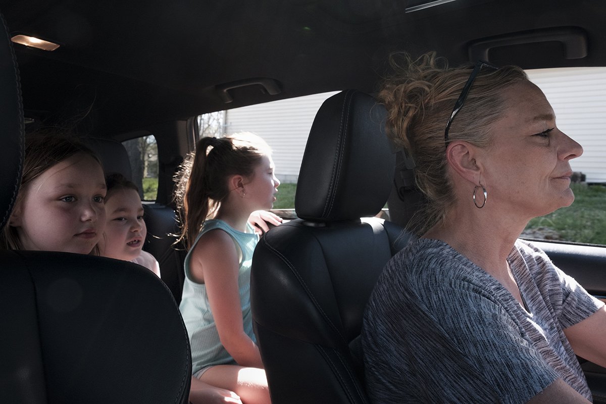 Traci Mascher drives her granddaughters Brayla, Kayton and Raylix to a creek to investigate the body of a dead skunk that the girls found floating in the water. The Mascher family evacuated to a relative's house in West Virginia through the summer of