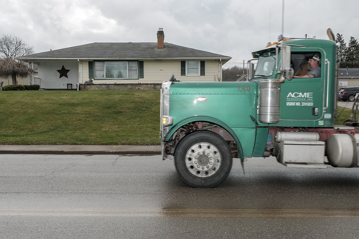 The Sovich home on East Taggart Street is kitty corner from one of the entrances to the derailment site. A steady stream of trucks and heavy equipment rumble down the street all day. On rainy days, the air is thick and nauseating.