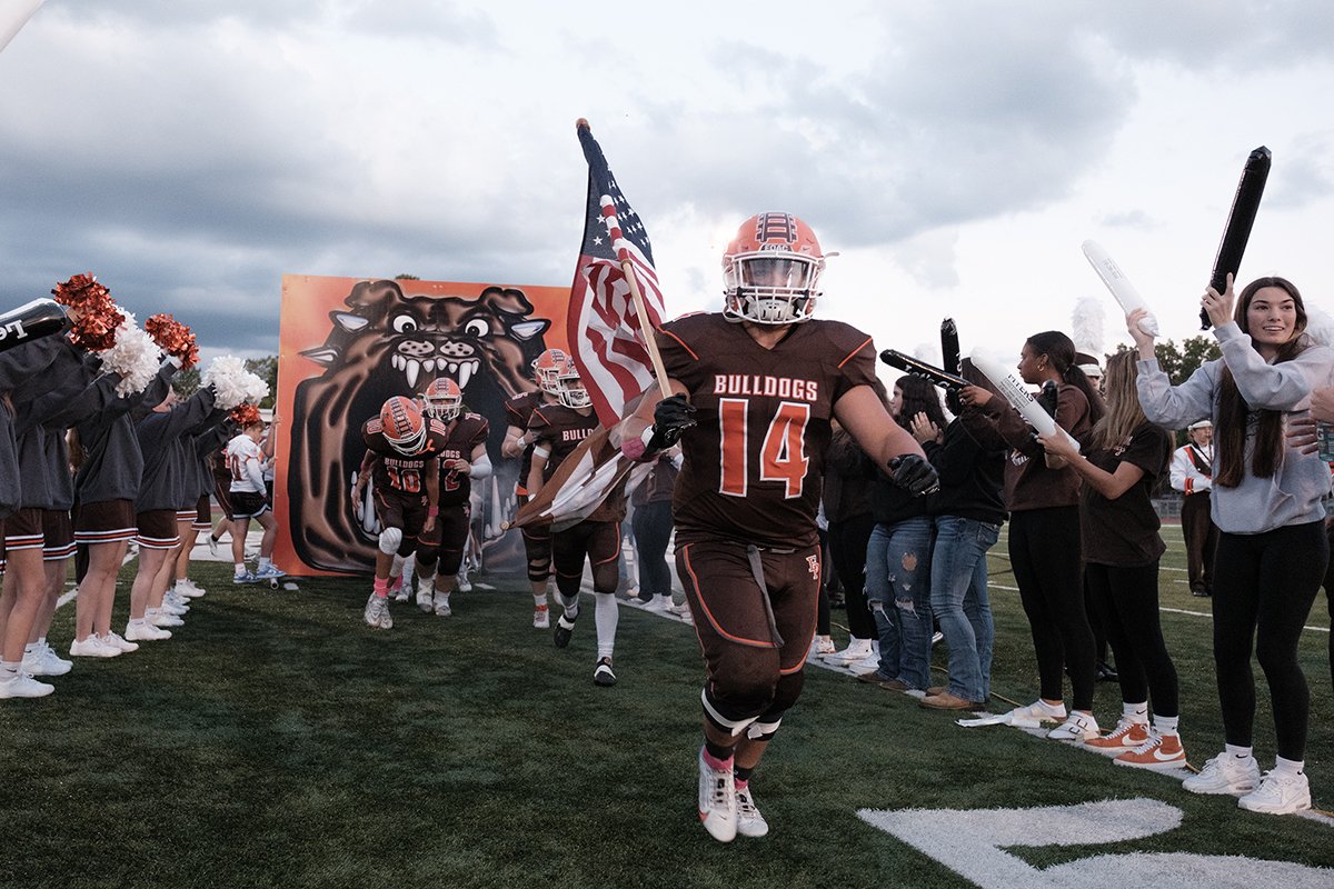 The East Palestine Bulldogs take the field against Columbiana High School. October, 2023.