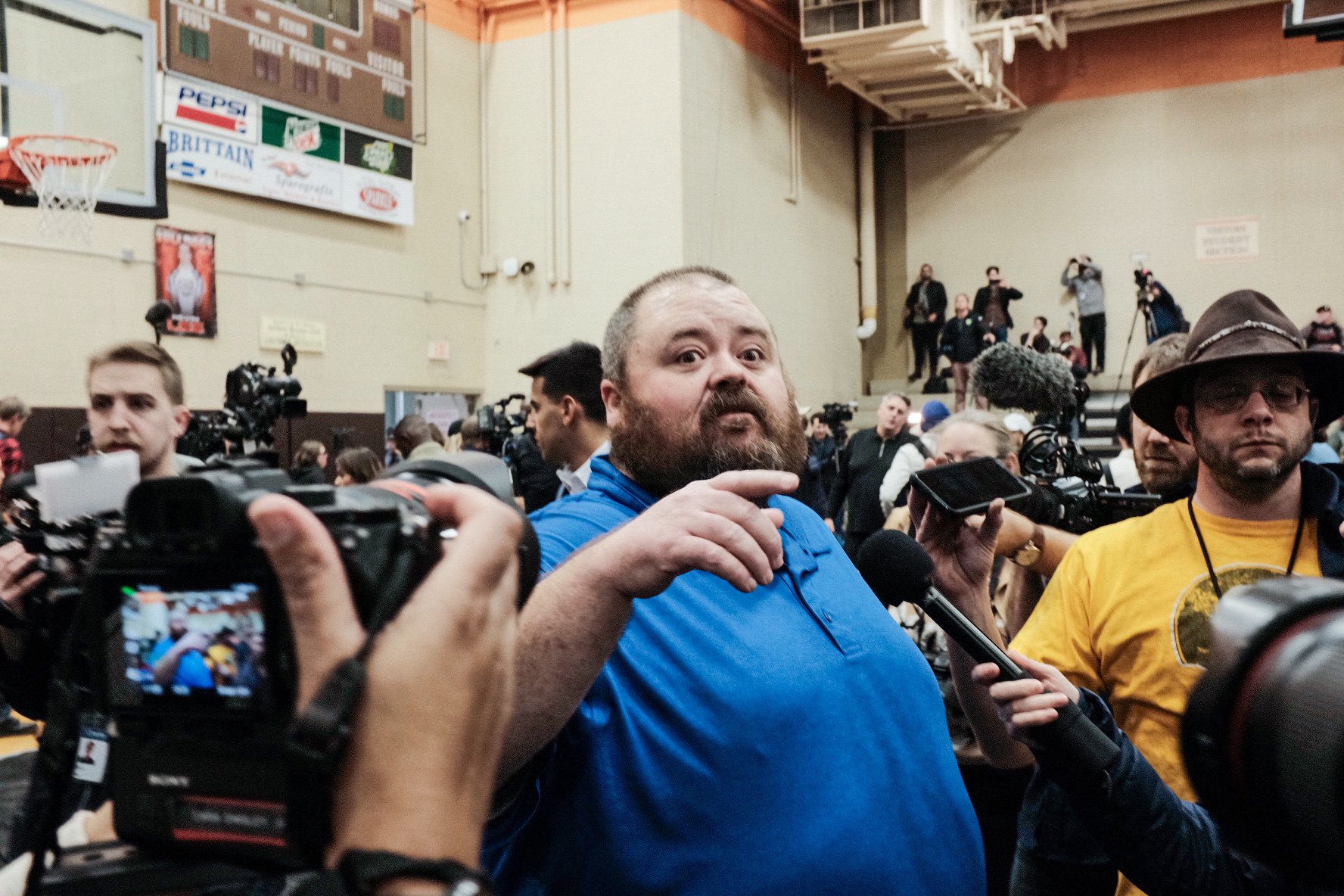 East Palestine mayor, Trent Conaway addresses the media during a town hall meeting at East Palestine High School. February, 2023.