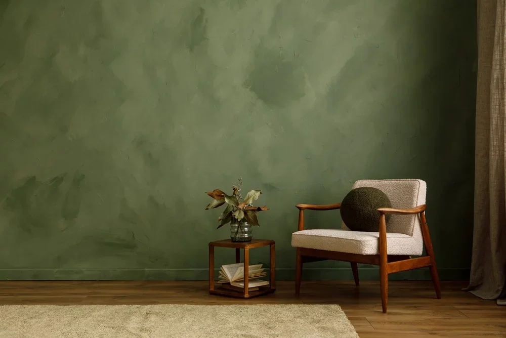 Olive Green Interior with Chair and Flowers