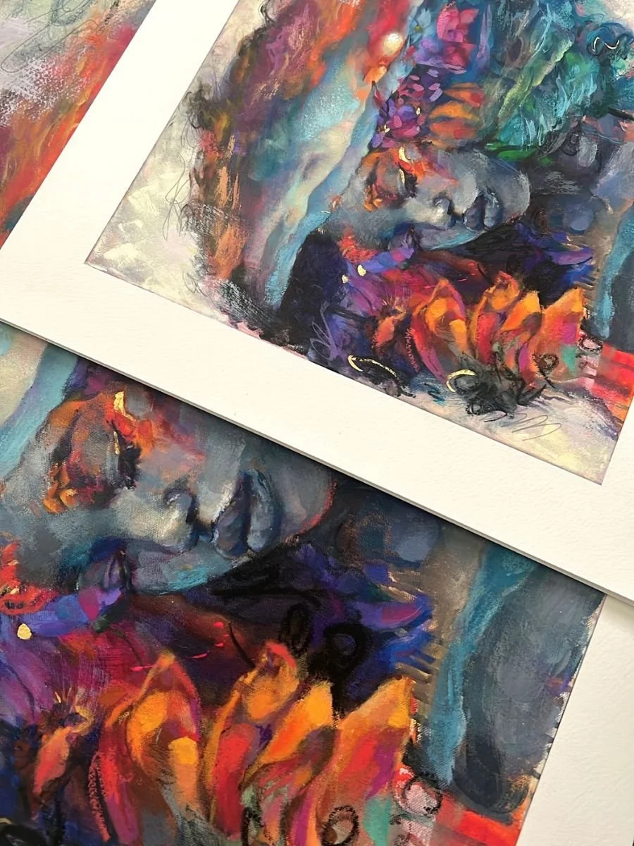 Stack of archival giclee prints of "Sol" in sizes small, medium, and large