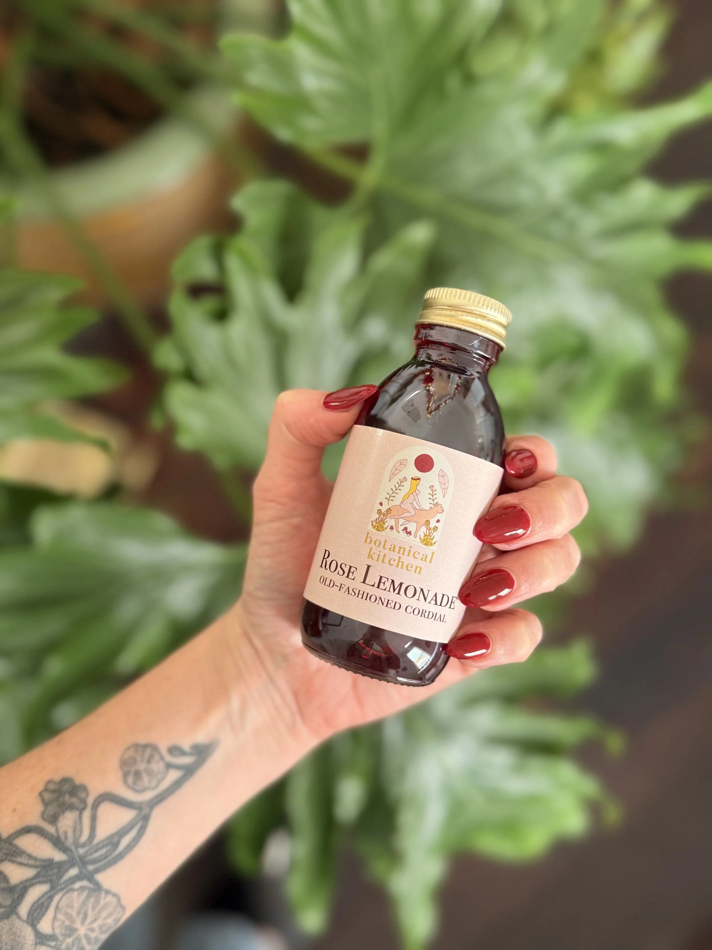 Floral rose lemonade drink made from real roses and lemon, refreshing summer botanical beverage