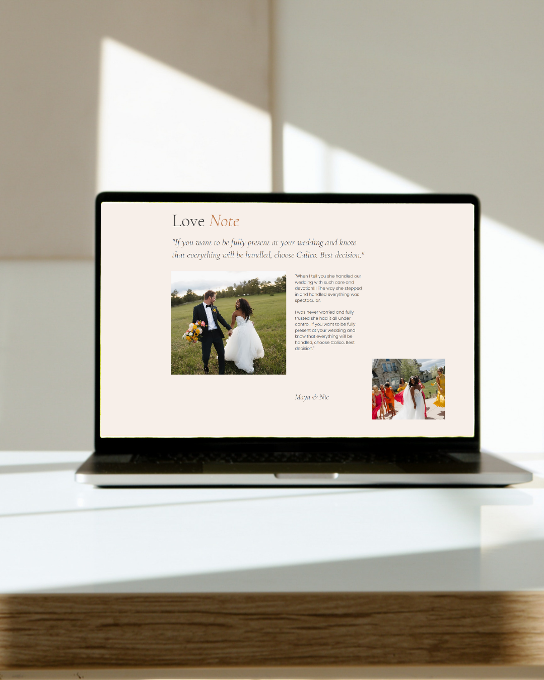 Laptop displaying a wedding-themed note with pictures and quotes, placed on a white desk with sunlight and shadows in the background.