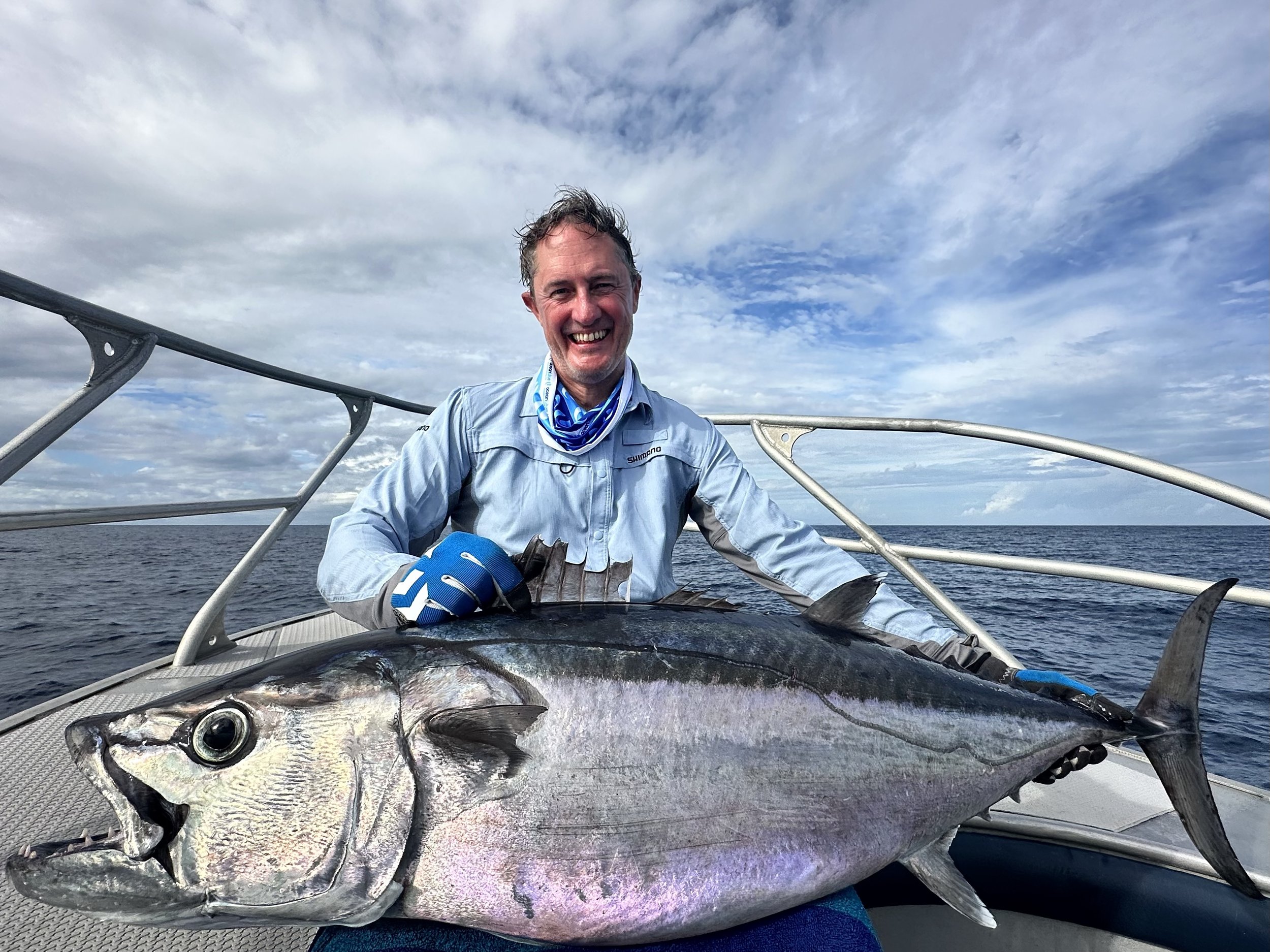 John with his personal best dogtooth.
