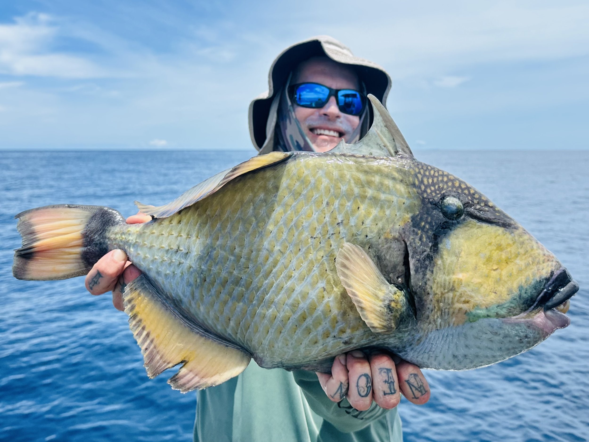 Ryno with his first ever titan triggerfish.