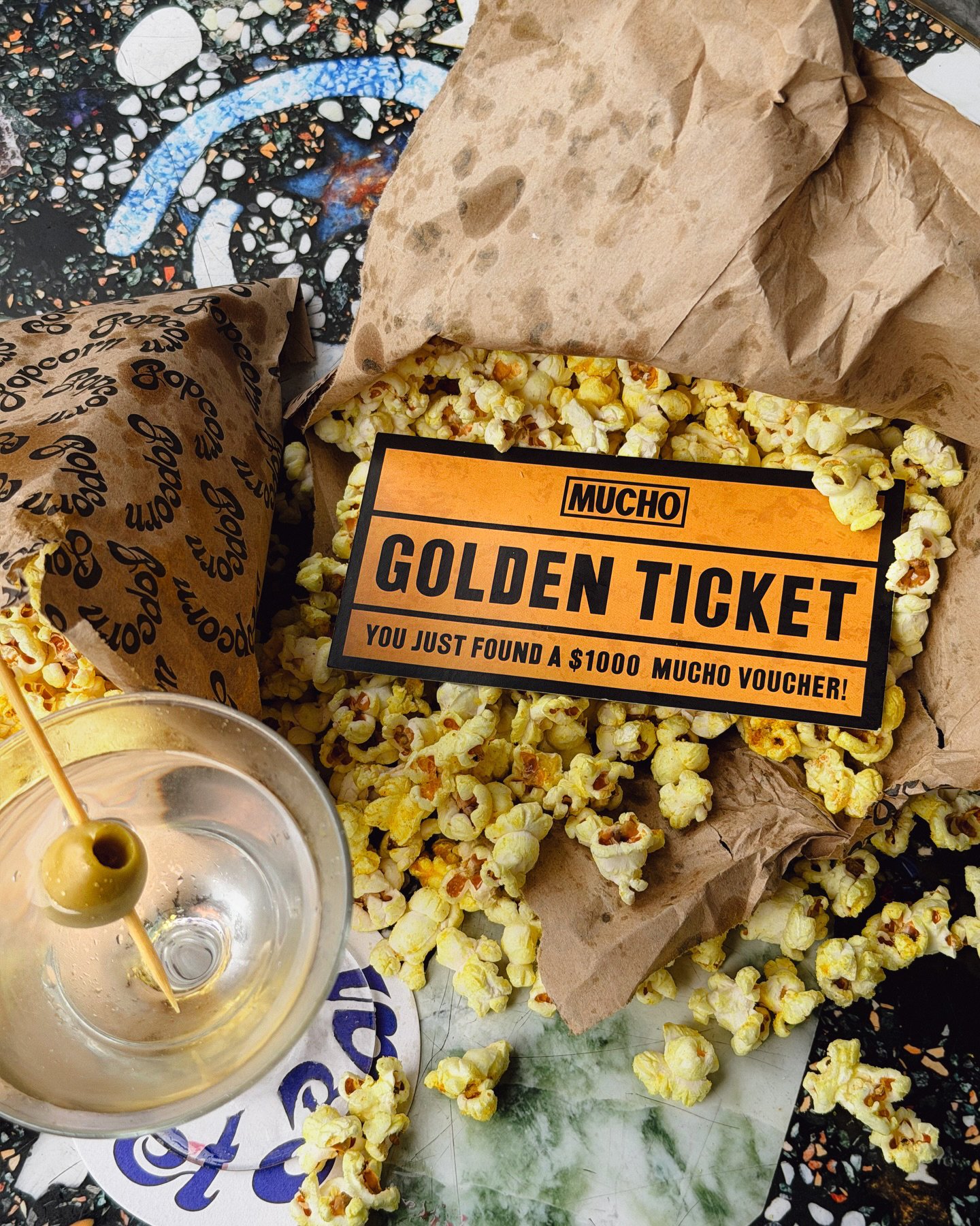 Find a Golden Ticket in Your Popcorn to Win one of six $1,000 Vouchers