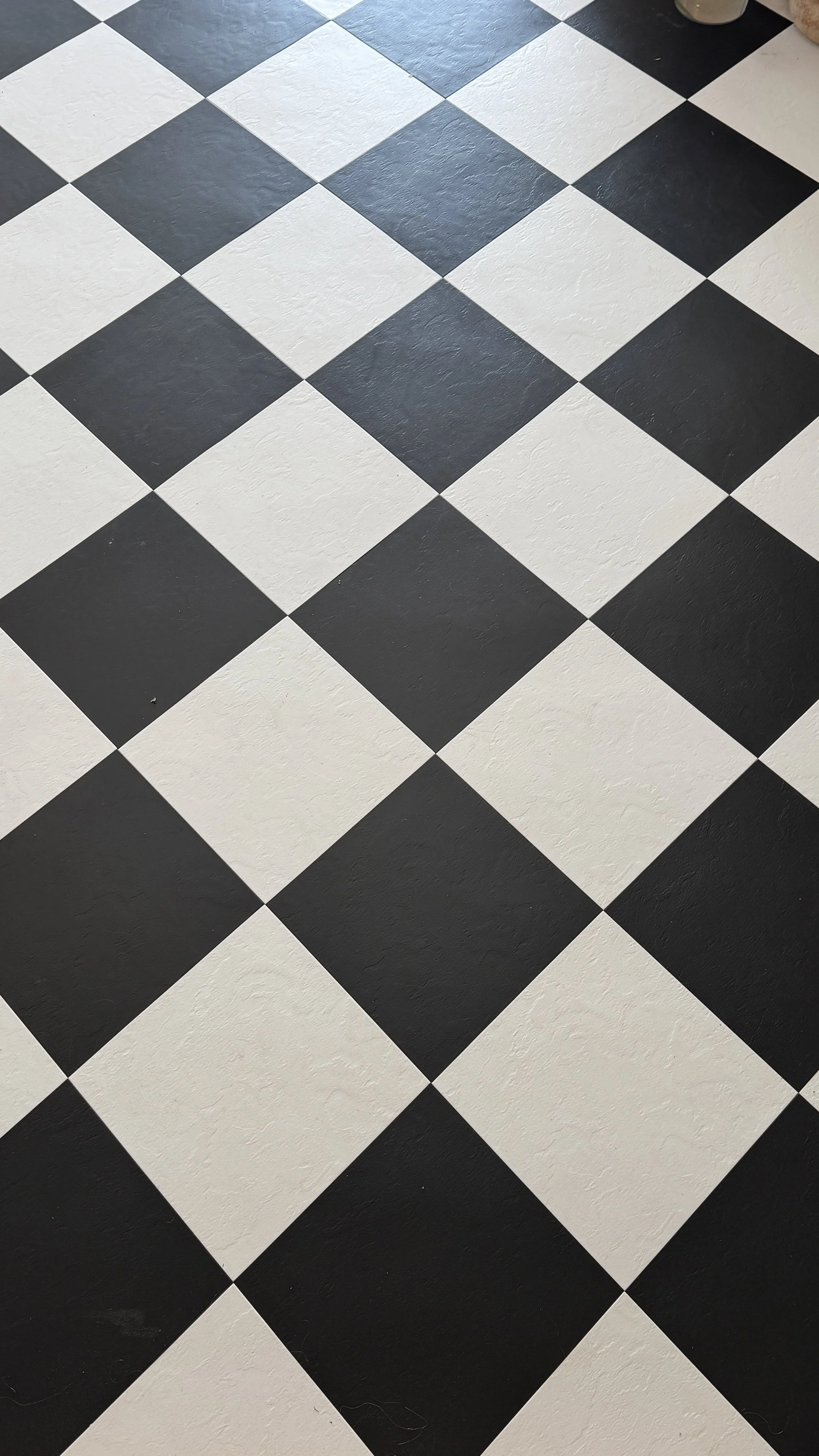 Black and white checkered tile floor.