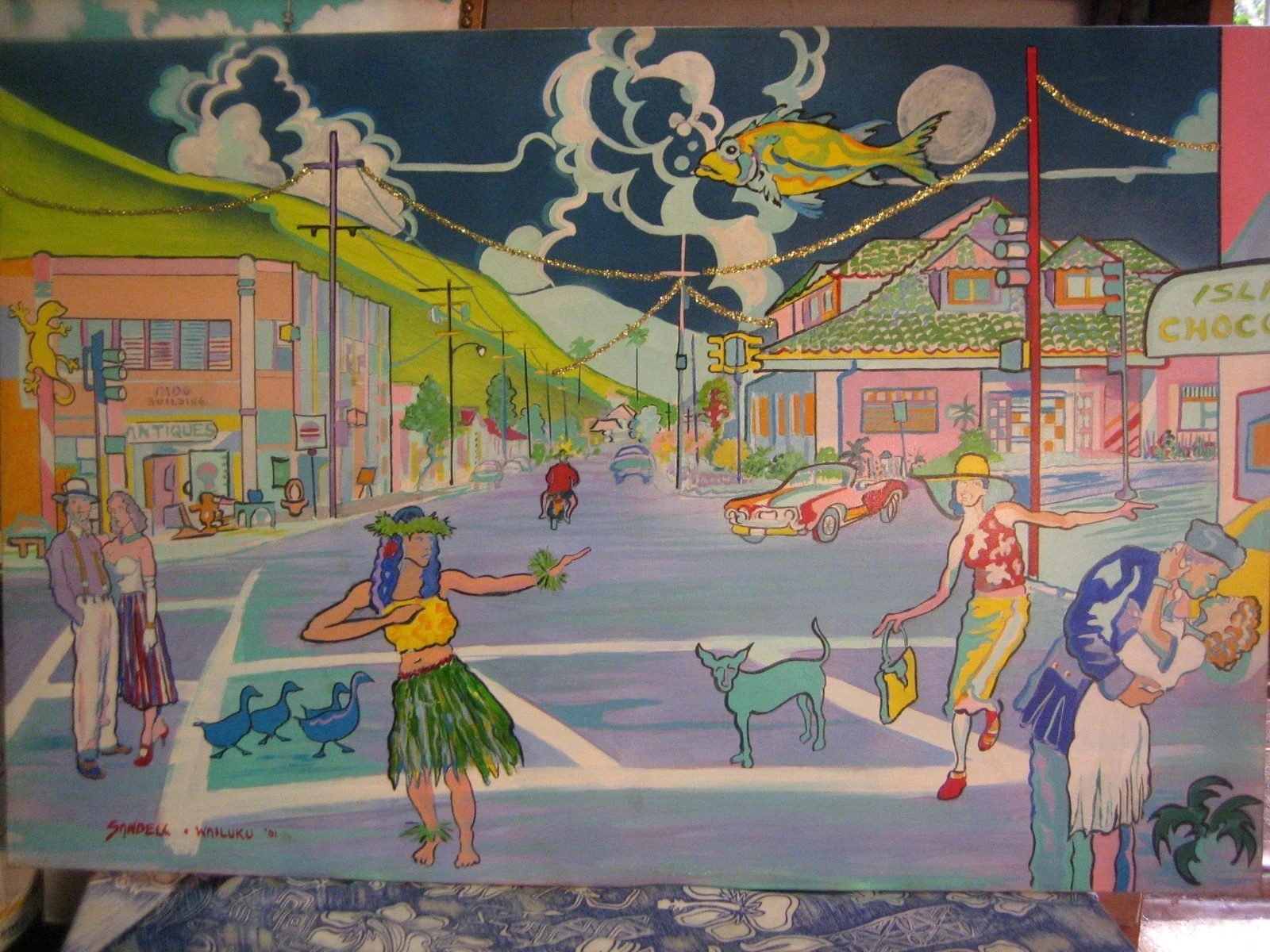 Colorful mural depicting a lively street scene with people, animals, and buildings under a moonlit sky.