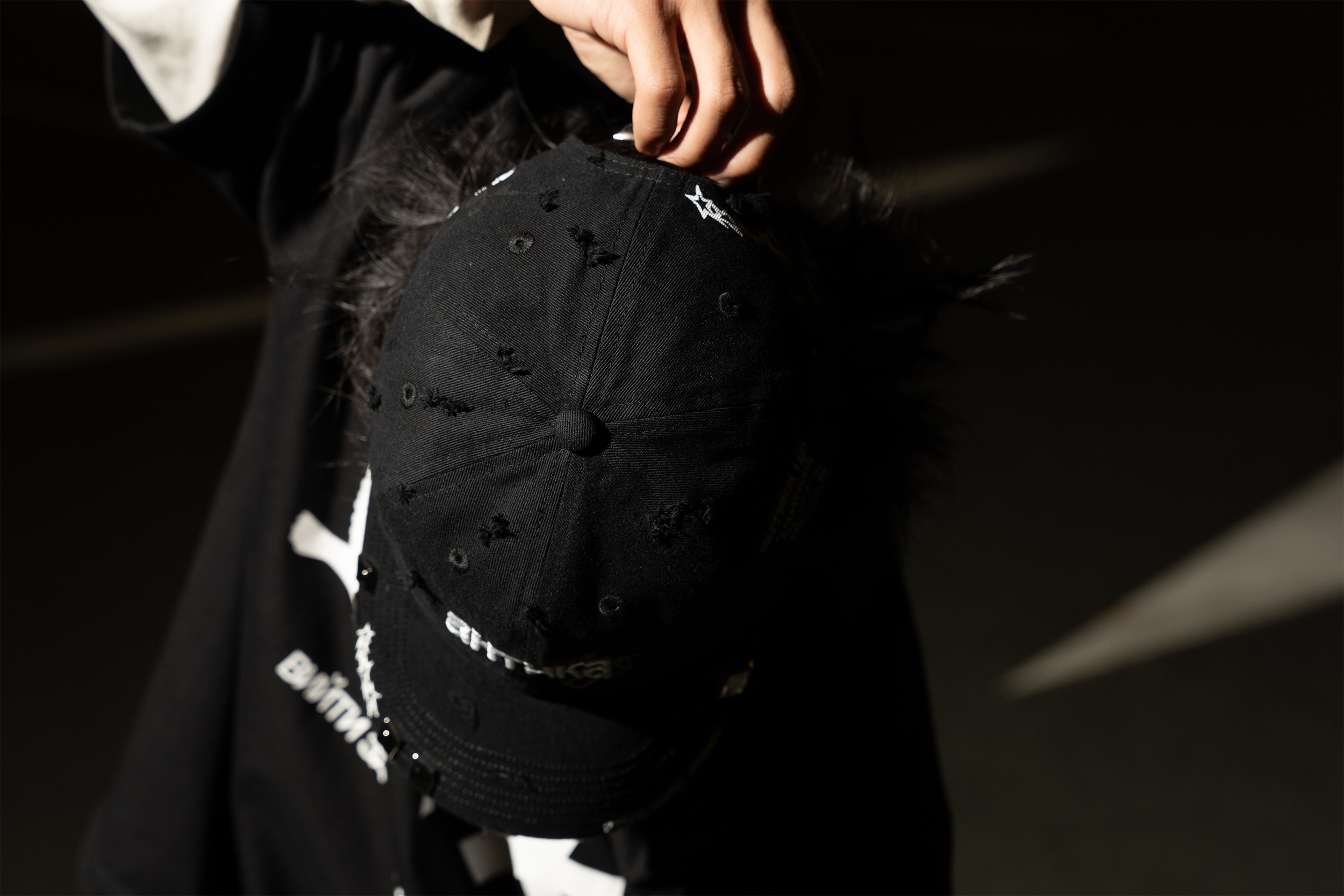BLACK AHTNKA HAT STILL 2.png