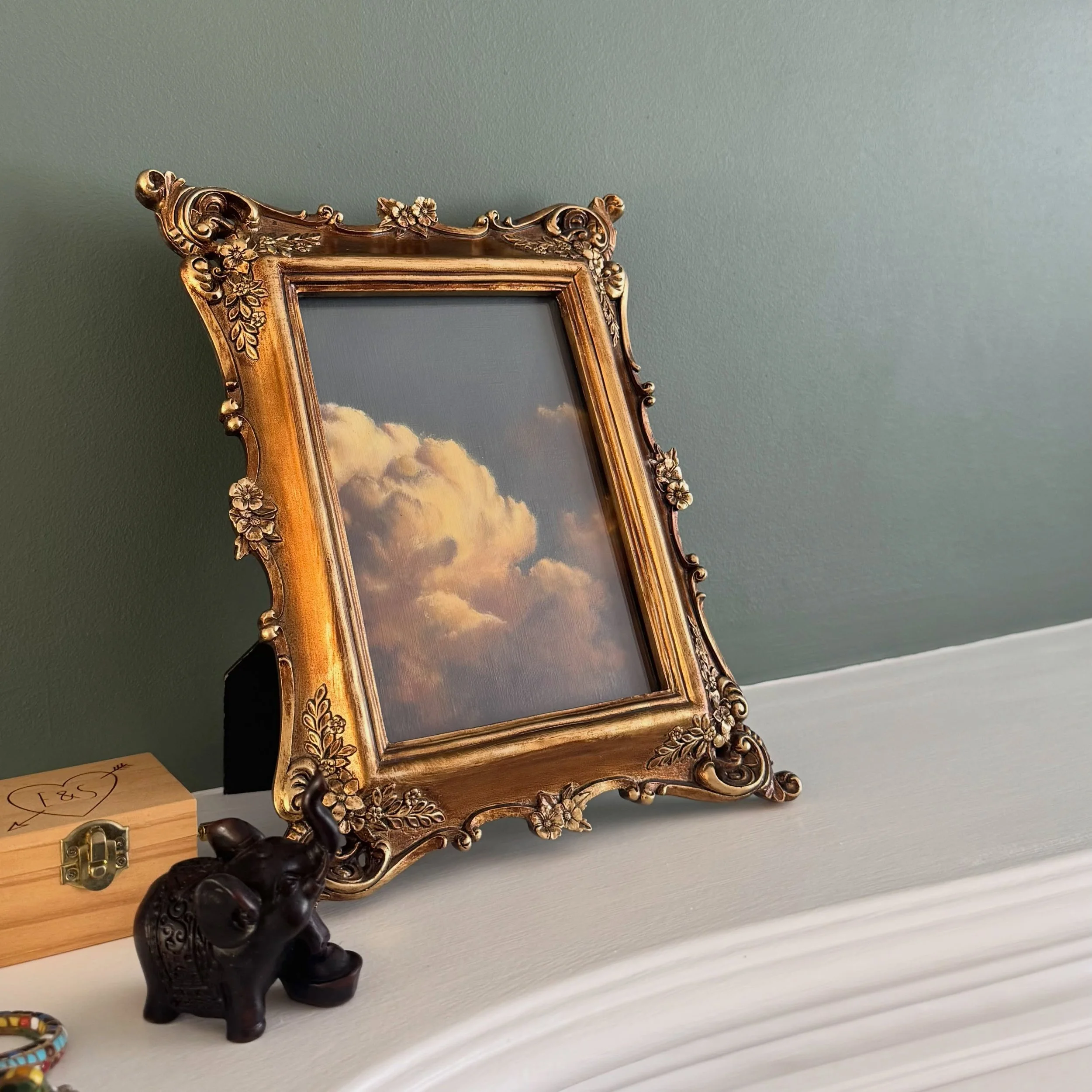 This one&rsquo;s been sitting on the mantelpiece a few days now and I keep stopping when I walk past it. Which feels like cheating, since I painted it.

The frame was a charity shop find. The green wall is a new thing here. The cloud is mine.

Oil on