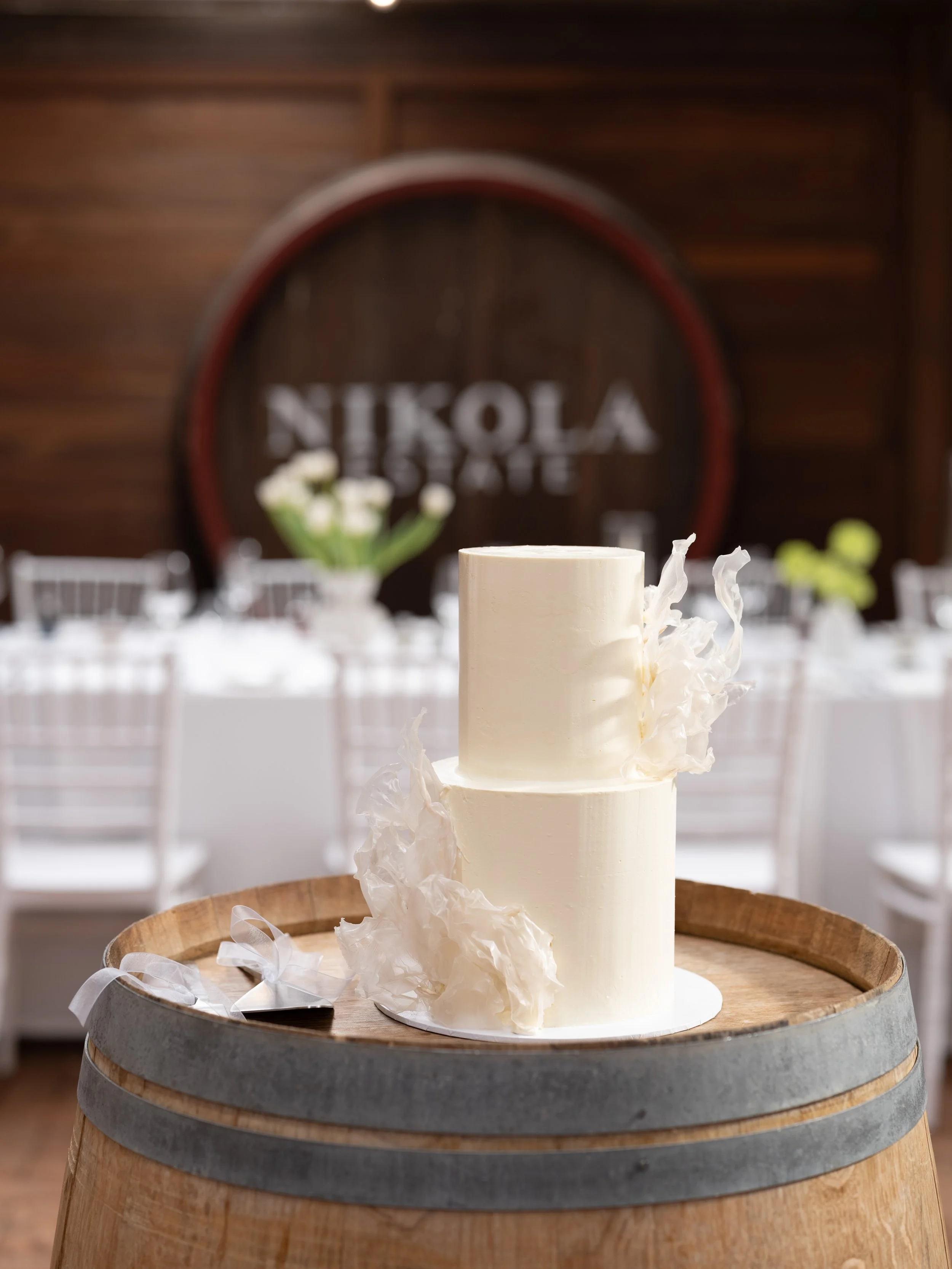 Two tier buttercream wedding, minimal design, elegant, rice paper sail wedding cake, Luxury cake design, minimalist design