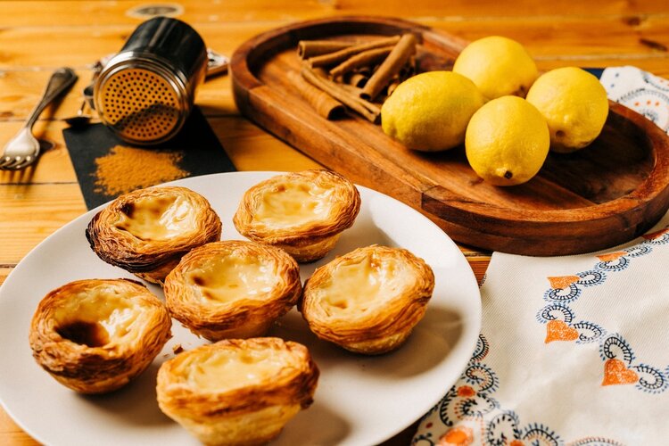 Some people do cakes, but we think you should do plates... of pastel de nata for your next celebration. Pre-order your festive tarts online via lisboacaffe.com. Both delivery and pick-up options are available.