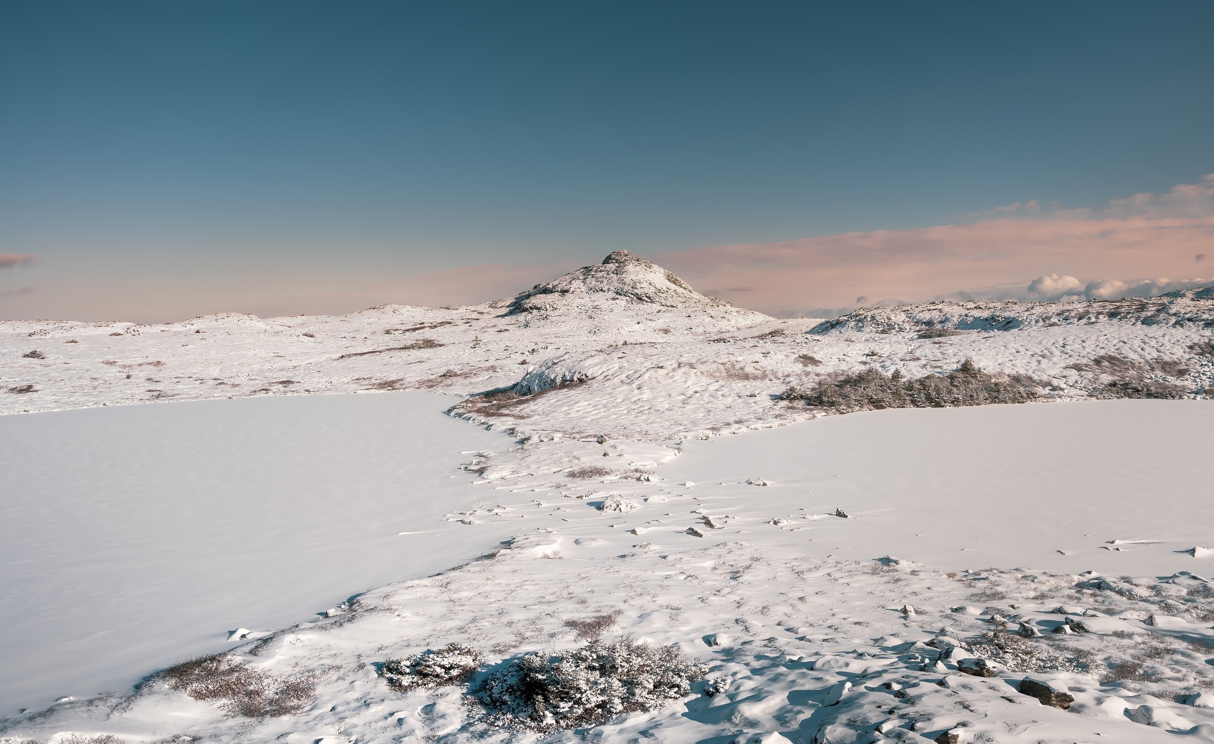 Snowfall blankets the rugged terrain across Doe Hills of the Musgrave Group, Newfoundland. Taken: Doe Hills, Newfoundland.